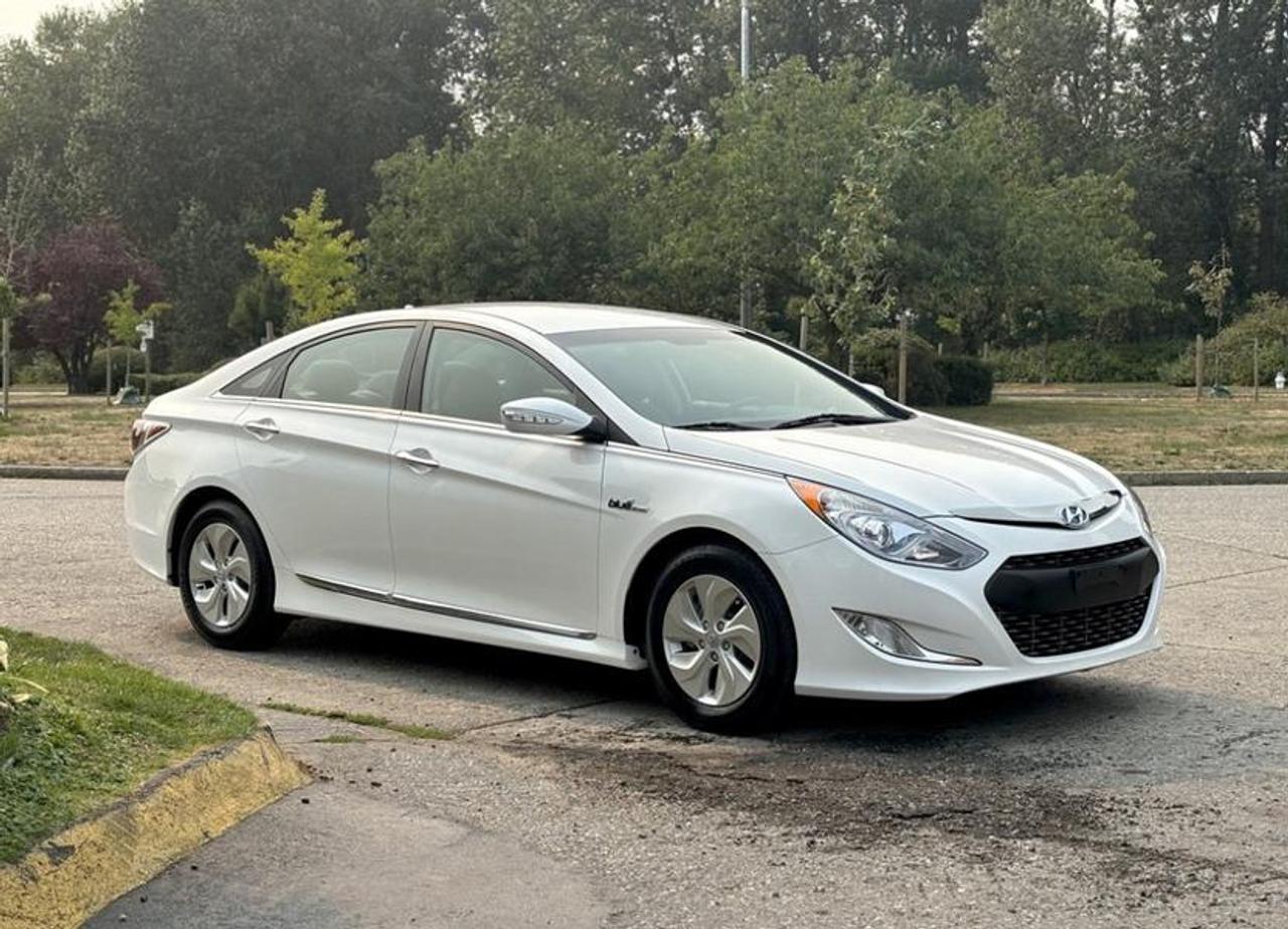This 2015 Hyundai Sonata Hybrid is powered by a 2.4L 4-cylinder hybrid powertrain paired with an automatic transmission and front-wheel drive. Combining hybrid efficiency with midsize sedan comfort, it is well suited for daily commuting and long-distance travel.

The cabin is equipped with heated front seats, dual-zone automatic climate control, heated mirrors, Bluetooth connectivity, a backup camera, cruise control, AM/FM radio, CD player, and ECO Mode to help optimize fuel efficiency. Additional features include air conditioning and heat, along with power windows, power door locks, and power mirrors for everyday convenience.

The vehicle measures approximately 15 feet 10 inches long, 6 feet 1 inch wide, and 4 feet 10 inches high.

Finished in white with a gray cloth interior, this Hyundai Sonata Hybrid offers a spacious cabin, practical comfort features, and the efficiency of a hybrid powertrain. This item is currently OFFSITE. You must register an appointment with our office to schedule an offsite viewing. Appointments must be made a minimum of one business day in advance (and as defined by the days that Repo.com is open for business) before your appointment can be scheduled and confirmed. We may, at our own discretion, instead opt to transport smaller items to Repo.coms main yard for viewing purposes.  $15,910.00 plus $375 processing fee, $16,285.00 total payment obligation before taxes.   Listing report, warranty, contract commitment cancellation fee. All above specifications and information is considered to be accurate but is not guaranteed and no opinion or advice is given as to whether this item should be purchased. We do not allow test drives due to theft, fraud, acts of vandalism and undetectable impaired driving. Instead we provide the following benefits: Complimentary Warranty (with options to extend), Limited Money Back Satisfaction Guarantee on Fully Completed Contracts, Contract Commitment Cancellation, and an Open-Ended Sell-Back Option. Ask seller for details or call 604-522-REPO(7376) to confirm listing availability.