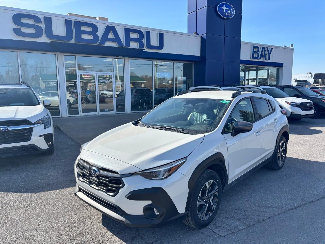 <p>Price includes all fees and taxes, and the following installed accessories: Rear Bumper Cover, Security Package and Wheel Lock Kit, HST and licensing fees are extra.</p><p> </p><p>Use this link to view the brochure for the Crosstrek – <a target=_blank rel=noopener noreferrer nofollow href=https://joom.ag/k5vd><u>https://joom.ag/k5vd</u></a>.</p><p> </p><p>Crosstrek Touring features include, 17-inch aluminum alloy wheels, 5-spoke, two-tone with machined finish, LED fog lights, Heated front seats and leather wrapped heated steering wheel, an 11.6-inch touch-screen infotainment system with wireless Apple CarPlay® and Android Auto™ functionality, 6 speakers and SiriusXM® Satellite Radio with Travel Link® (subscription required), Subaru Rear/Side Vehicle Detection System (SRVD) and MySubaru® Connected Services.</p><p> </p><p>Call us today to book your test drive, and, while you are visiting, ask our Sales Team about Subaru’s lease and finance options.</p><p> </p><p>All new Subaru vehicles come with a new vehicle limited warranty. Our warranties include 3 years unlimited mileage of roadside assistance, 3 years or 60,000 kms (which ever comes first) of comprehensive coverage as well as coverage on the powertrain and major components for 5 years or 100,000 kms, which ever comes first.</p><p> </p><p>Ask our sales team about our extended warranty coverage that is available and can be tailored to meet your driving needs.</p>