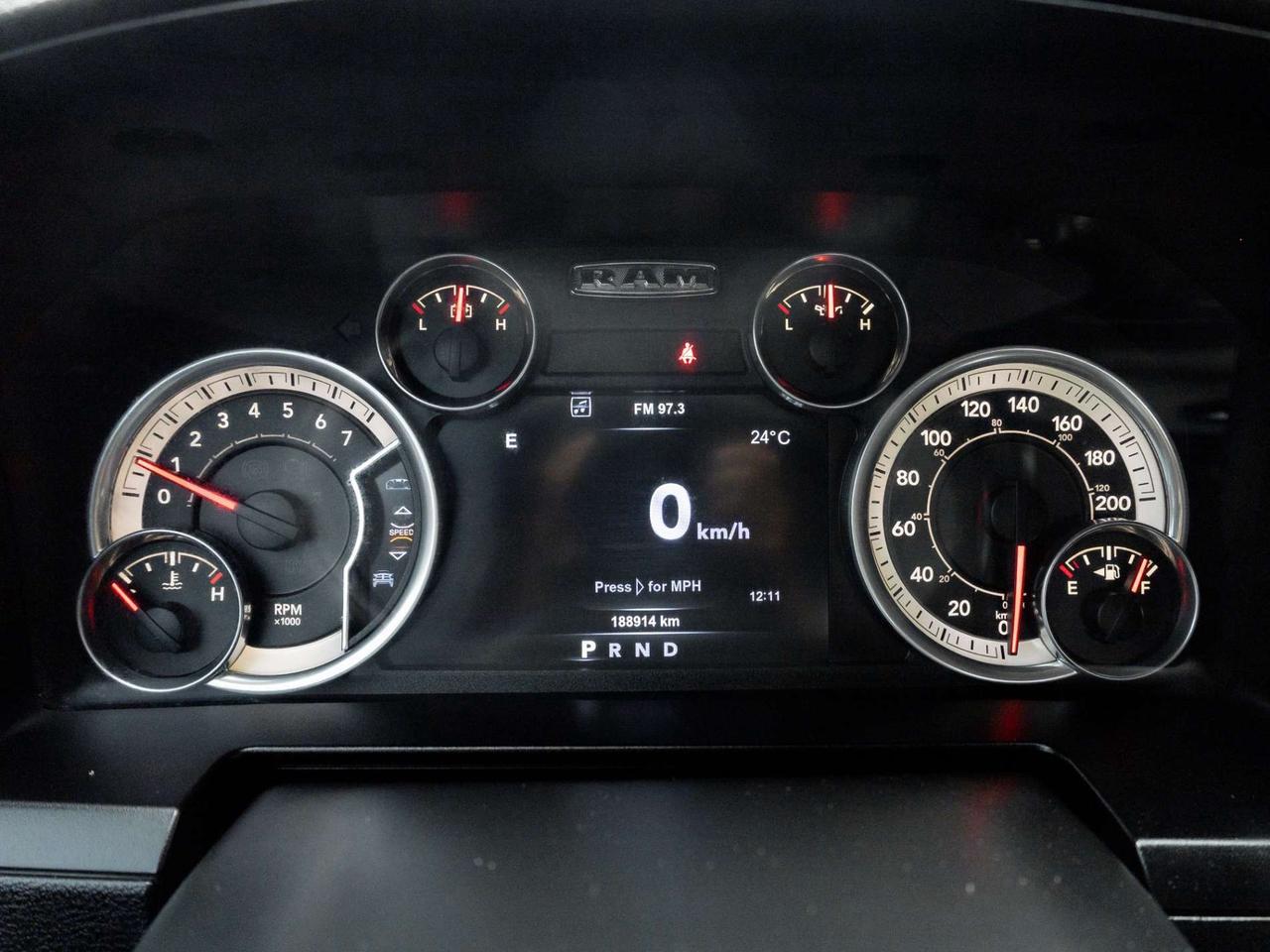 2015 RAM 1500 4WD Quad Cab 140.5 Sport Photo