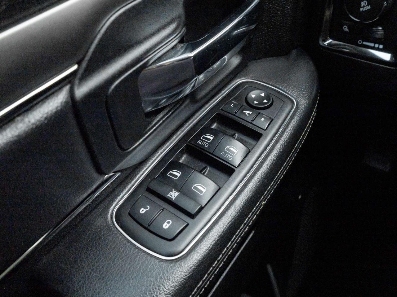 2015 RAM 1500 4WD Quad Cab 140.5 Sport Photo