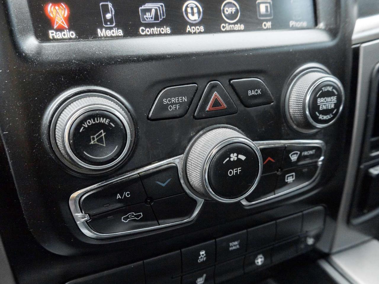 2015 RAM 1500 4WD Quad Cab 140.5 Sport Photo