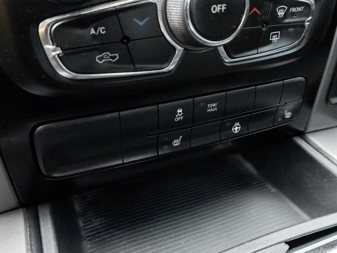 2015 RAM 1500 4WD Quad Cab 140.5 Sport Photo