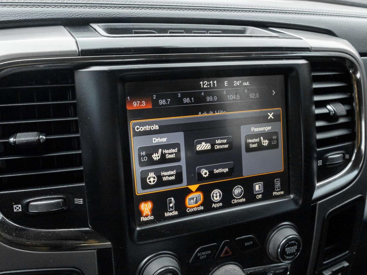 2015 RAM 1500 4WD Quad Cab 140.5 Sport Photo