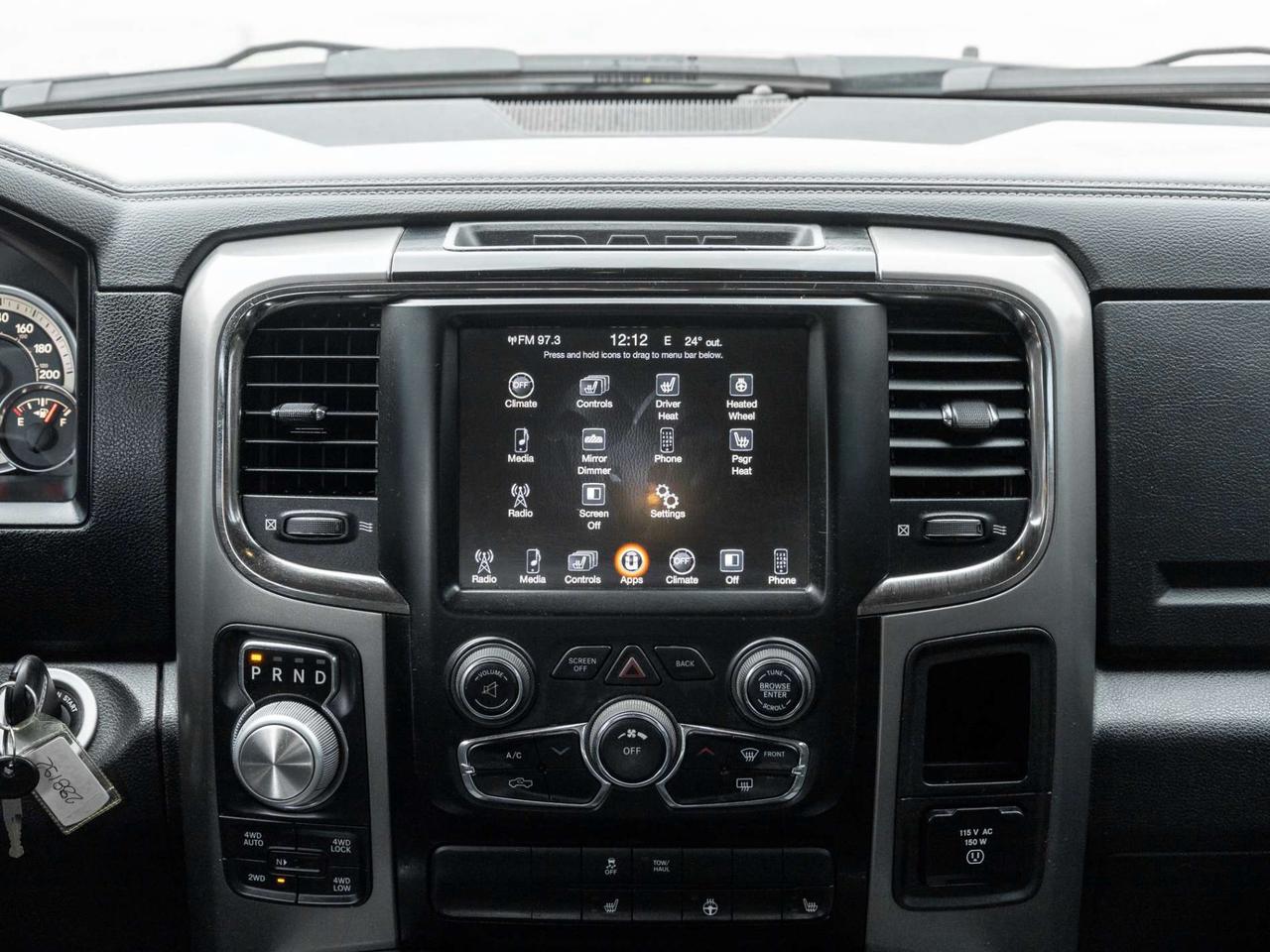 2015 RAM 1500 4WD Quad Cab 140.5 Sport Photo