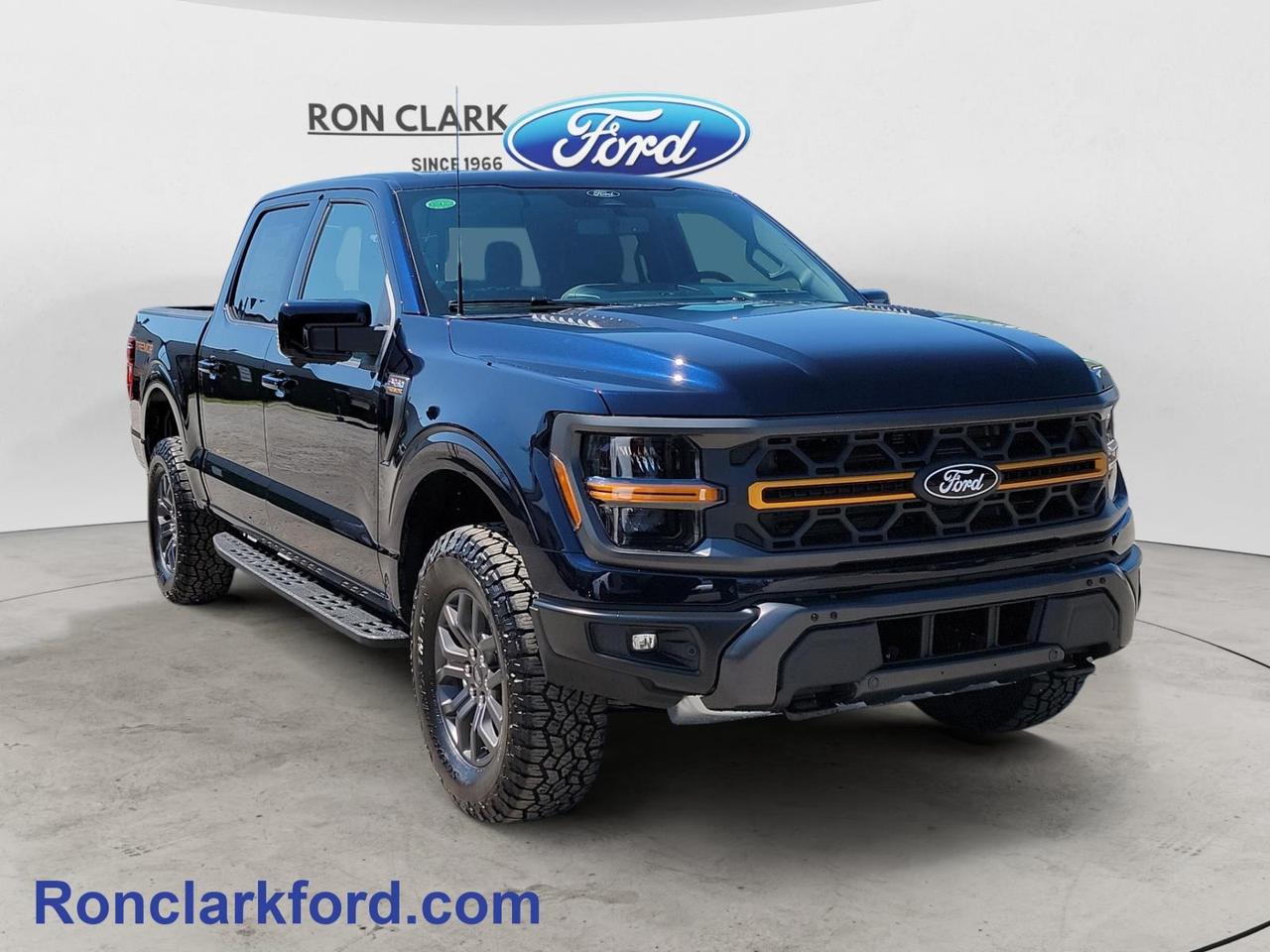 Meet the 2026 Ford F-150 Tremor, finished in stunning Antimatter Blue with a premium Black leather-trimmed interior. Equipped with the 402A Equipment Group, this Tremor delivers an impressive combination of rugged capability, premium comfort, advanced technology, and everyday versatility. The Bed Utility Package and innovative Pro Access Tailgate make accessing and organizing the truck bed easier, while the Tow/Haul Package and integrated Trailer Brake Controller provide added confidence when towing. With 2kW Pro Power Onboard, you can conveniently power tools, equipment, camping gear, and more right from the truck. Inside, the Mobile Office Package helps transform the cabin into a functional workspace, while the wireless charging pad keeps compatible devices powered without the clutter of cords. Completing the experience is the premium B&O Unleashed Sound System, delivering exceptional audio throughout the cabin. With its bold Tremor styling, off-road capability, premium features, and versatile equipment, this 2026 F-150 Tremor is ready for everything from the daily drive and jobsite to towing and weekend adventures.Come to the dealer you can trust. 58 years and counting Ron Clark Ford & Jayco RV is known for great value and being best in customer service! We serve and deliver all over Ontario including destinations such as Wyoming, Petrolia, Sarnia, London, Guelph, Kitchener-Waterloo, Hamilton, GTA, Ottawa & Chatham-Kent. Call or visit us at RON CLARK FORD & JAYCO RV to view and test drive today! RON CLARK FORD where else!!