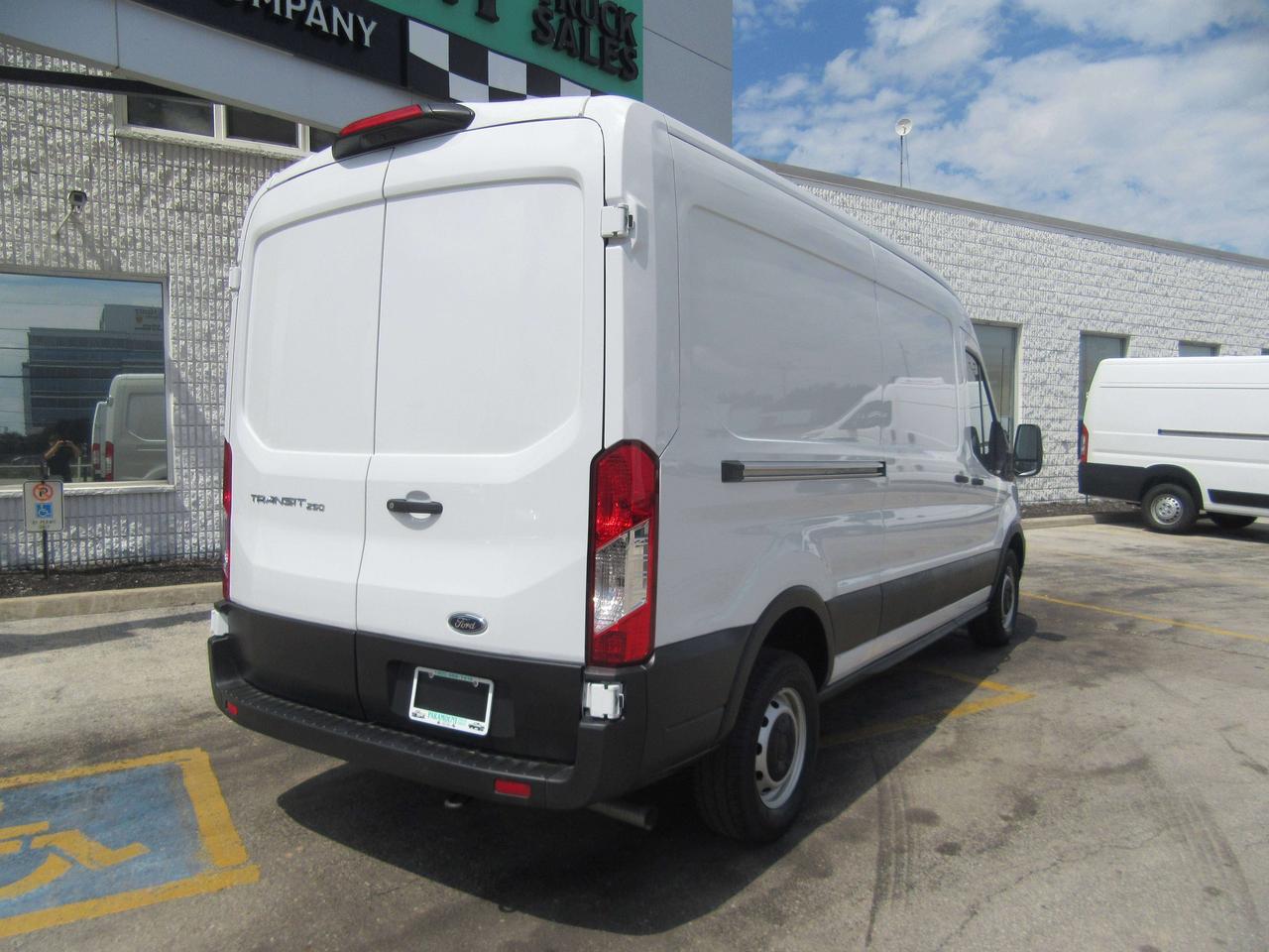 2023 Ford Transit T-250 148 WB MEDIUM ROOF CARGO VAN Photo