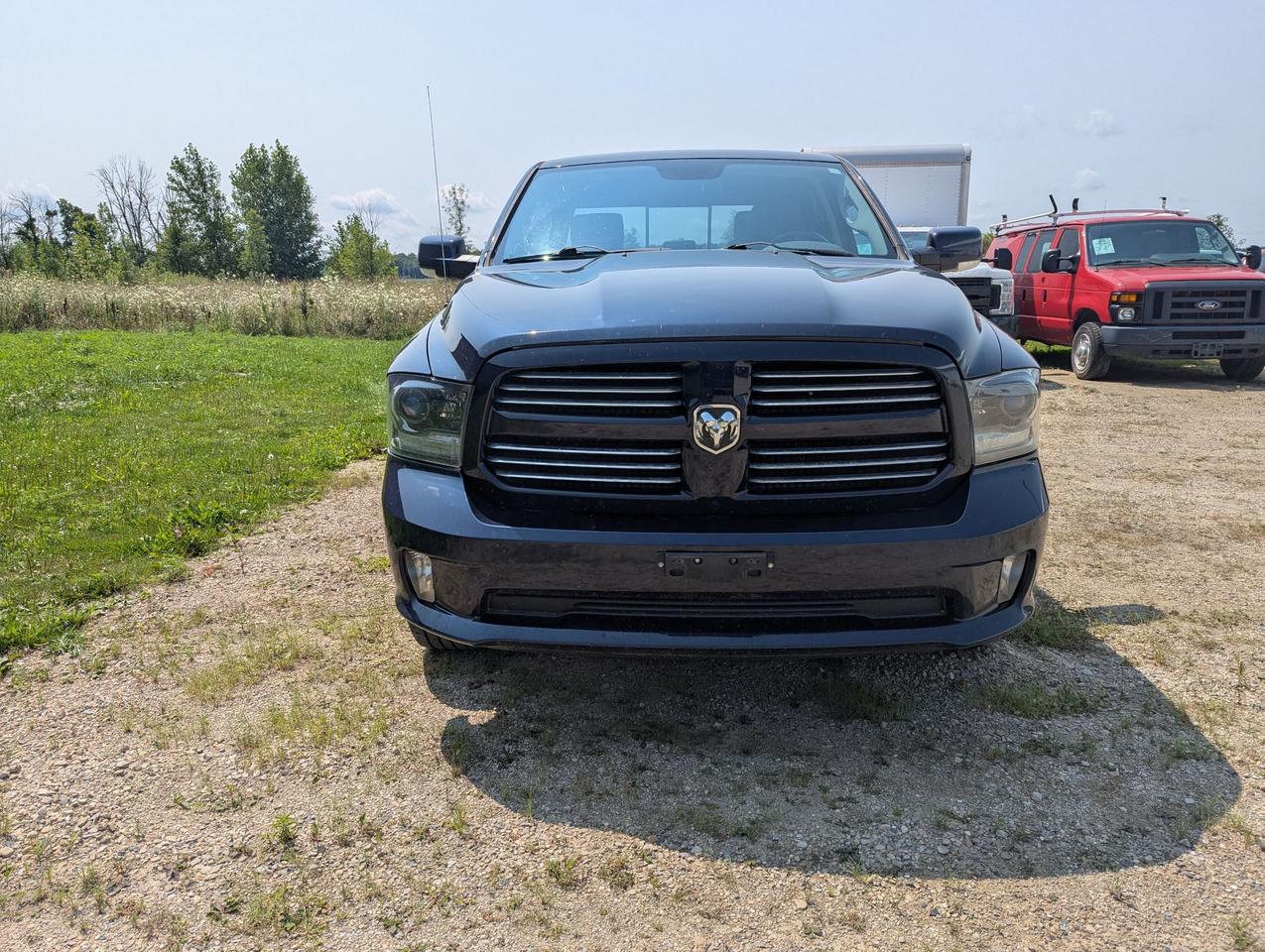 2015 RAM 1500 Crew Cab Sport 4x4 Photo1