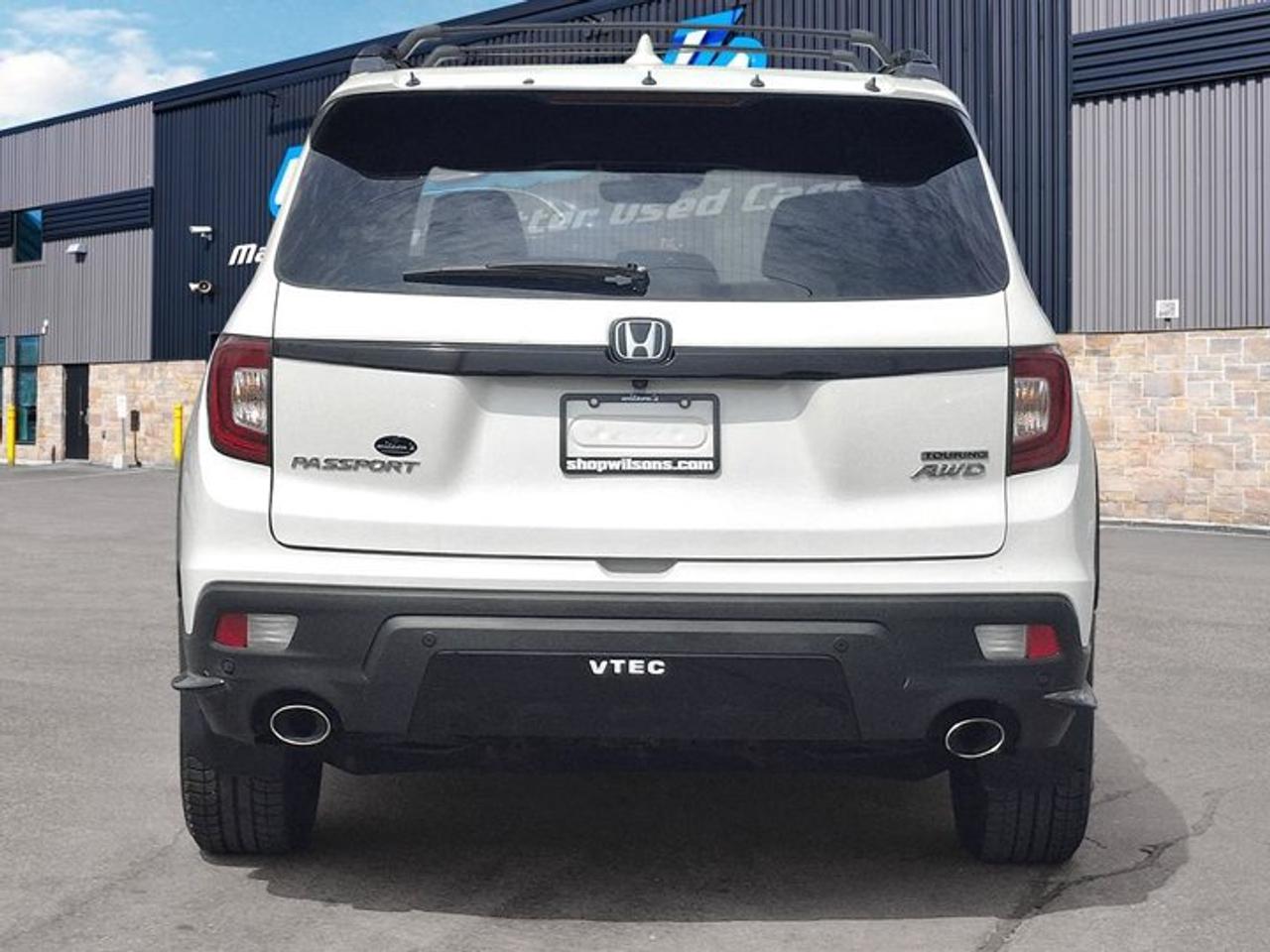 2019 Honda Passport Touring AWD | Leather | Heated Seats + Steering | Cooled Seats | Sunroof | Blind Spot Monitor & More Photo