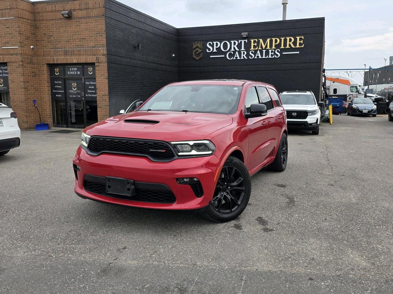 *AWD* *HEATED SEATS* *COOLED SEATS* *AUTOMATIC* *NAVIGATION* *REVERSE CAMERA* *LEATHER* Safety Certificate NOT included in the price | SAFETY: $699 Year :2021 Make: DODGE Model: DURANGO Trim: R/T AWD Kms: 112,810 finance Price: $31,880 cash price: $32,880 Sport empire cars Offering a beautiful Dodge Durango with 112,810 kms!! For the affordable price of $31,880+HST and licensing. Beautiful Red exterior with a Black leather interior. Professionally detailed and ready to go. Perfect combination of reliability, comfort and luxury. Buy with Trust with an Ontario registered dealer. Please note: The listed price is a finance-only special. If you wish to purchase the vehicle with cash, a $1,000 premium will be added to the sale price. ** In accordance with OMVIC regulations, please be advised that the vehicle being offered is not currently certified, e-tested or drivable. Certification is available for an additional fee starting from $699. With our safety package the vehicle comes with a 36 day safety standard warranty.