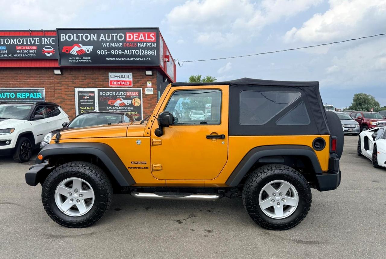2014 Jeep Wrangler Sport 4WD V6 Photo