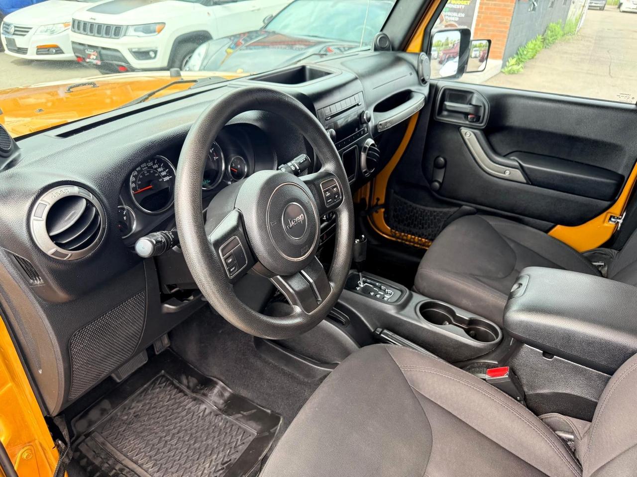 2014 Jeep Wrangler Sport 4WD V6 Photo
