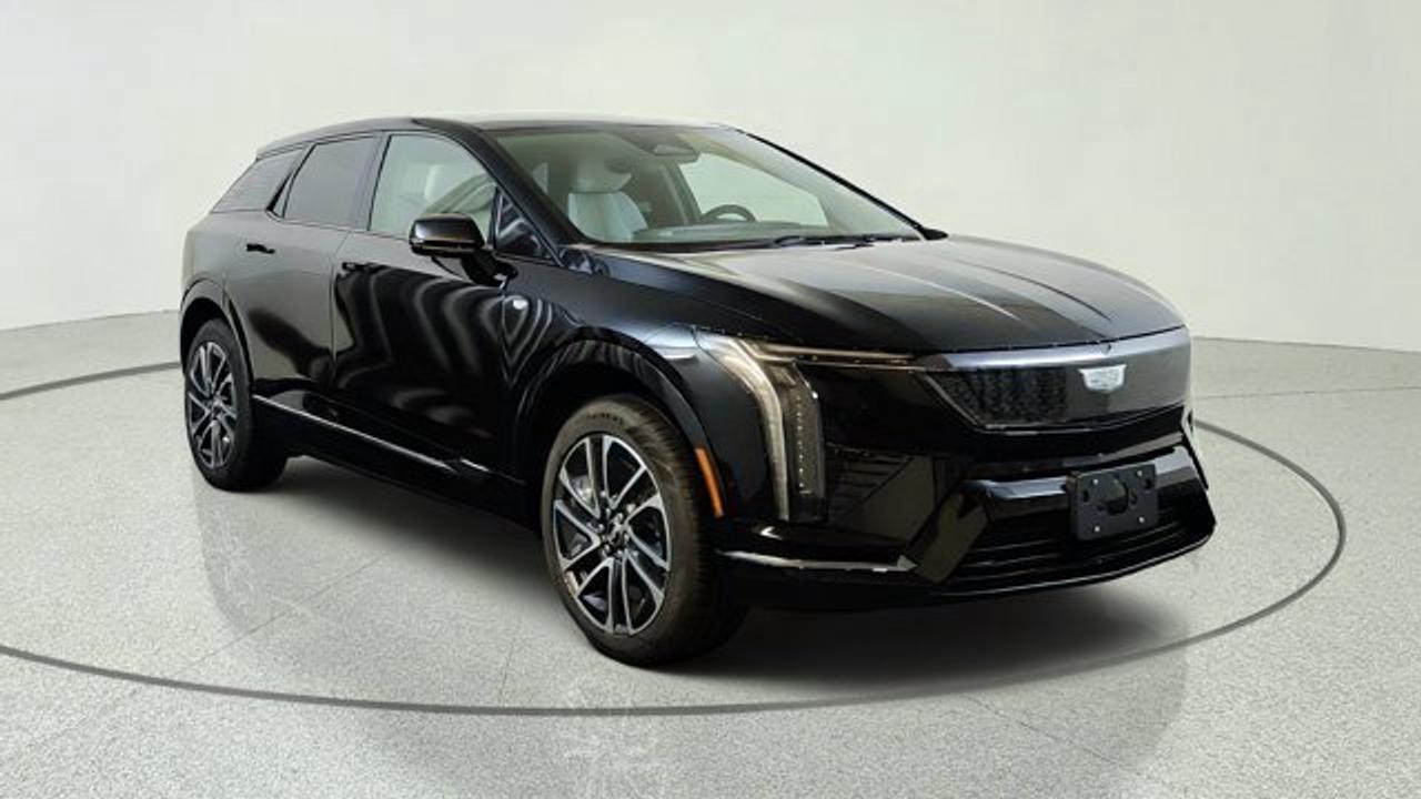 The 2027 Cadillac OPTIQ Sport delivers a refined all-electric luxury SUV experience with bold styling, responsive dual-motor all-wheel drive, and impressive everyday versatility. Its range of 482 km on a full charge will impress. Its sleek exterior is complemented by a premium cabin featuring advanced technology, including a large curved LED display with Google built-in, wireless Apple CarPlay and Android Auto compatibility, and a premium audio system for an immersive driving experience. Designed with comfort in mind, the OPTIQ Sport offers spacious seating, high-quality materials, and a generous cargo area, making it ideal for both daily commutes and weekend getaways. Advanced driver assistance features, including Cadillacs latest safety technologies and available Super Cruise hands-free driving capability, help provide confidence and convenience on the road. Combining luxury, innovative EV performance, and cutting-edge technology, the 2027 Cadillac OPTIQ Sport is an outstanding choice for drivers seeking a premium electric SUV.