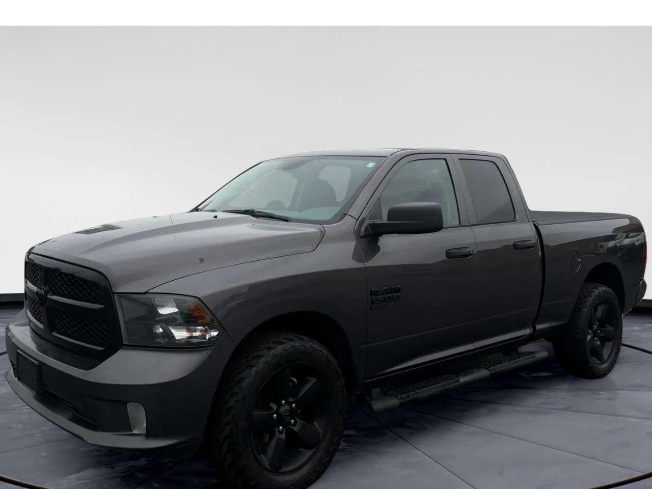Experience the robust power of the 2019 Ram 1500 Classic Express, featuring a stunning 4x4 drivetrain and smooth automatic transmission. Tailored for those who appreciate both rugged functionality and style, this truck stands out on the road. The exterior of the 1500 Classic Express bears a bold presence, with a commanding Quad Cab design and a practical 64" box. Coupled with heated mirrors, its engineered to handle a variety of weather conditions, making every drive dependable and secure. Inside, enjoy the convenience of air conditioning and power windows, offering a comfortable journey for both driver and passengers. Stay connected and safe with integrated technology like a backup camera and cruise control, designed to assist you on every adventure. The inclusion of brake assist further ensures your security on the road, providing peace of mind wherever your travels take you. This truck is perfect for adventurers and those who need a reliable vehicle for work or play. Visit Windsor Chrysler to learn more about how the 2019 Ram 1500 Classic Express can be a versatile addition to your lifestyle. Our team is here to answer your questions and help you make it yours today.