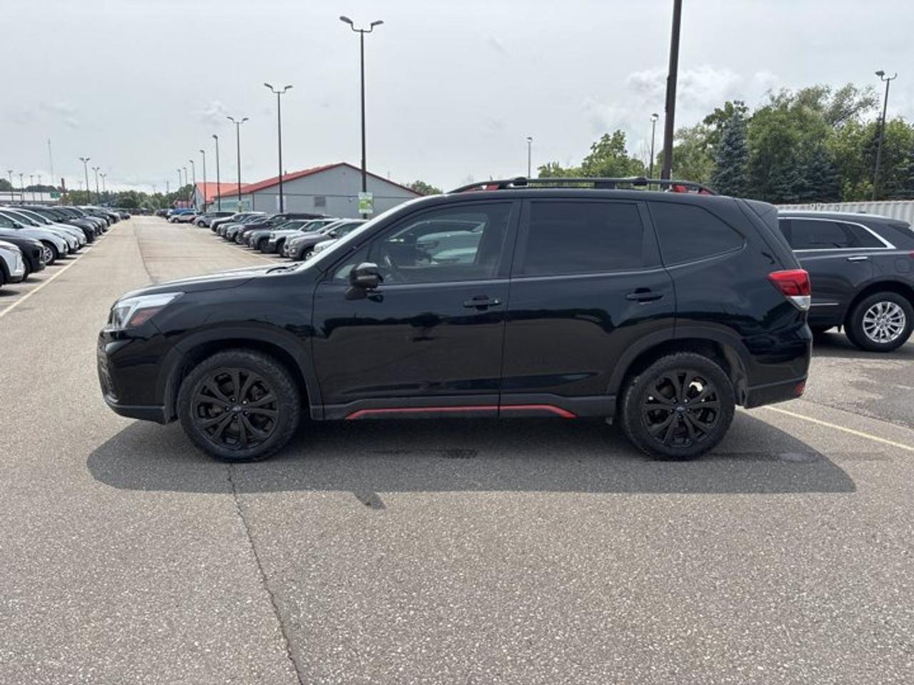 This 2021 Subaru Forester 2.5i Sport | Sunroof | Heated Steering Wheel is a smart choice for drivers who want confidence, comfort, and year-round capability in one practical SUV. Offered by Haldimand Motors Ltd. in Cayuga, this used Forester pairs Subaru utility with a 2.5-litre gas engine, CVT, and 4-door versatility. Finished in Black with a Grey interior, it shows 110,000 km and brings together useful features like a sunroof, heated steering wheel, heated front seats, Apple CarPlay, Android Auto, and adaptive cruise control.<br /><br />FEATURES OF THE Forester 2.5i Sport | Sunroof | Heated Steering Wheel<br /><br />   Power sunroof adds light and fresh air<br />   Heated steering wheel for cold morning comfort<br />   Heated front seats help beat winter<br />   Black exterior gives a clean, bold look<br /><br />ADVANCED SAFETY FEATURES<br /><br />   Backup camera helps with reversing confidence<br />   Blind spot monitor supports safer lane changes<br />   Lane departure warning adds extra awareness<br />   Side and head airbags enhance protection<br /><br />The 2021 Subaru Forester 2.5i Sport | Sunroof | Heated Steering Wheel is well suited to busy family life and daily commuting. Its practical safety equipment includes anti-lock braking system, stability control, child safety locks, automatic door locks, passenger airbag sensor, and automatic headlights for added peace of mind on every drive.<br /><br />PERFORMANCE AND EFFICIENCY<br /><br />   2.5-litre gas engine delivers balanced power<br />   CVT supports smooth everyday driving<br />   Dual shift mode adds driving control<br />   Limited slip differential aids traction<br /><br />This 2021 Subaru Forester 2.5i Sport | Sunroof | Heated Steering Wheel focuses on easy, predictable performance. Power steering helps with low-speed maneuvers, while adaptive cruise control and cruise control make highway travel more relaxed. The suspension and drivetrain setup are known for stable road manners and confidence in changing Canadian conditions.<br /><br />COMFORT AND CONVENIENCE<br /><br />   Heated steering wheel warms cold hands<br />   Dual-zone climate control helps everyone stay comfortable<br />   Power driver seat adds easy adjustment<br />   Power liftgate simplifies cargo area access<br /><br />Inside, the 2021 Subaru Forester 2.5i Sport | Sunroof | Heated Steering Wheel offers thoughtful touches for daily use. You also get front air conditioning, automatic climate control, drivers seat lumbar support, power windows, illuminated vanity mirrors, heated mirrors, electric mirrors, rear trunk access, cargo cover, tinted windows, and push button start.<br /><br />TECHNONOLGY AND CONNECTIVITY<br /><br />   Apple CarPlay keeps apps within reach<br />   Android Auto supports easy phone integration<br />   Bluetooth integration enables hands-free communication<br />   Steering wheel audio controls simplify operation<br /><br />The 2021 Subaru Forester 2.5i Sport | Sunroof | Heated Steering Wheel also includes satellite radio, HD Radio, and a clear interface designed for simple use on the move. These features help keep drivers connected and entertained, while reducing distraction through easy access to music, calls, and key functions.<br /><br />CARGO SPACE<br /><br />   Wide rear opening eases larger loading<br />   Cargo cover helps conceal stored items<br />   Rear trunk access adds daily practicality<br />   SUV layout supports flexible carrying needs<br /><br />The 2021 Subaru Forester 2.5i Sport | Sunroof | Heated Steering Wheel is built for active routines. Groceries, sports gear, travel bags, and everyday cargo fit more easily thanks to the useful rear space and upright body design. The power liftgate also makes loading simpler when your hands are full.<br /><br />AWARDS & RECOGNITIONS<br /><br />   Top Safety Pick, Insurance Institute for Highway Safety, 2021<br />   Best Compact Utility Vehicle, The Car Guide, 2021<br /><br />WHAT OTHER OWNERS LIKE<br /><br />   Excellent outward visibility for daily driving<br />   Comfortable ride on city and highway roads<br />   Easy entry and practical cargo usefulness<br />   User-friendly controls and strong safety confidence<br /><br />This 2021 Subaru Forester 2.5i Sport | Sunroof | Heated Steering Wheels VIN is: JF2SKEMC8MH432171.<br /><br />WHY CHOOSE US? <br /><br />Honest & Transparent Buying Experience: Weve been a trusted name in business since 1984.<br /><br />STRAIGHTFORWARD PRICING:<br />Our Advertised Price Includes:<br />>>Safety Certification (No separate fee!)<br />>>30-Day 100% Mechanical Warranty<br />>>FREE Carfax History Report.<br />>>No upcharge for paying cash.<br />(Prices Exclude HST and Licensing Fees only.)<br /><br />>>Browse 300+ vehicles all in ONE LOCATION<br /><br />EASY FINANCING: Great rates & open loans<br /><br />WE BUY CARS: Get Top Dollar for your trade-in, or sell us your vehicle for CASH! Even if you dont buy from us!<br /><br />STOP BY TODAY<br />Treat yourself - stop by Haldimand Motors Ltd. located at 42 Talbot St E, Cayuga, ON N0A 1E0 to make this car yours today!<br /><br />https://www.haldimandmotors.com/used/stock-461051.html