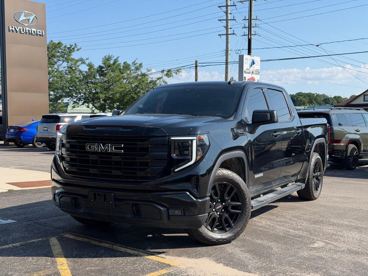 <p>Presenting the 2024 GMC Sierra 1500 Crew Cab Short Box 4-Wheel Drive Elevation in a striking black finish. With its robust 4×4 drivetrain and seamless handling, this truck is ready to conquer any terrain with confidence.</p> <p>The exterior is designed to make a statement, featuring bold design elements complemented by sturdy alloy wheels. Inside, the black interior radiates sophistication alongside heated front seats and a heated steering wheel, adding to your comfort on those brisk Canadian mornings. Feel the ease of keyless entry as you step in, and let the spacious cabin enhance your driving experience.</p> <p>Equipped with the advanced Elevation Preferred Equipment Group, this Sierra 1500 boasts a host of technological features aimed at keeping you connected and safe. Enjoy your favorite tunes with satellite radio or navigate effortlessly using the integrated navigation system displayed on a state-of-the-art touchscreen. Stay safely guided on long journeys with lane assist and take advantage of a comprehensive backup camera when parking. With features like a Wi-Fi hotspot and smart device integration, staying in touch has never been easier.</p> <p>This truck is ideal for those who need a vehicle that seamlessly integrates work and play, whether you're navigating busy city streets or exploring the unbeaten path. Experience the power and sophistication of the 2024 GMC Sierra 1500 by visiting Bourgeois Midland Hyundai. Contact us today to arrange a test drive and feel the power and comfort of this exceptional truck for yourself!</p> <p><strong>Why Choose the Bourgeois Auto Group?</strong></p><p>For 80 years, Bourgeois Auto Group has been delivering exceptional automotive experiences. Our factor trained teams work to ensure you receive the shopping experience you deserve; whether you're looking for a new or new-to-you vehicle.</p><p>Shop 24/7 with our online showroom and chat service, ensuring convenience every step of the way. No hidden fees, full disclosure, and every pre-owned vehicle comes with a Carfax® report for peace of mind.</p><p>We offer a wide selection of pre-owned vehicles, all competitively priced using real-time market data. Get the best deal on your purchase and trade-in with our free Live Market Analysis report.</p><p>Looking to sell your car? We buy any make or modelno purchase required. Our simple to use online trade valuation tool will provide you with a clear, transparent selling experience whether you buy our car or not.</p><p>Backed by hundreds dedicated employees across 4 convenient locations, were here to meet all your automotive needs. Visit us in Midland or Parry Sound and explore our inventory or schedule your next service today.</p> <p><strong>Financing Your Next Vehicle with Bourgeois Midland Hyundai:</strong></p><p>At Bourgeois Midland Hyundai, we make financing your next vehicle simple and stress-free! Our team works with trusted lenders to find flexible options tailored to your budget. Drive away with confidenceapply today!</p><p>Take advantage of our online pre-qualification tool, backed by Equifax and TD Bank to find the payment that works for you. Simply <a href=https://www.bourgeoishyundai.com/pre-qualify-for-financing/ rel=nofollow><strong>CLICK HERE</strong></a> to use our secure online credit tool with no impact to your credit. </p>
