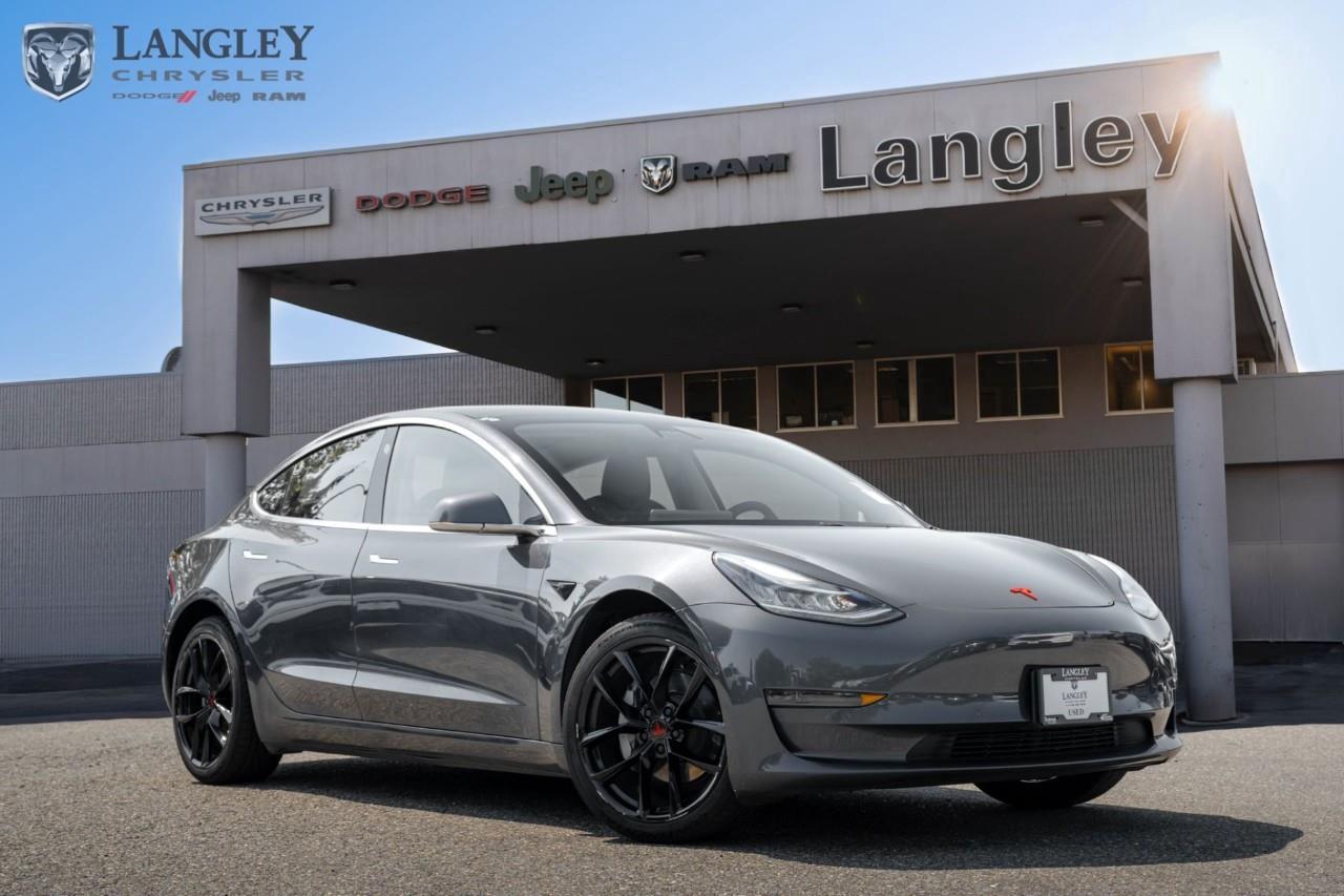 <p><strong>2020 Tesla Model 3 Standard Range Plus Standard Range Plus RWD</strong></p><p>An all-electric sedan built for daily driving efficiency and instant acceleration.</p><ul><li><p><strong>Electric Driving Range</strong>: Up to 402 km (250 miles)</p></li><li><p><strong>Battery Capacity</strong>: 50.0 kWh</p></li><li><p><strong>Drivetrain</strong>: Rear-Wheel Drive (RWD)</p></li><li><p><strong>DC Fast Charging</strong>: Up to 170 kW</p></li></ul><p>Come book a test drive at Langley Chrysler, conveniently located in Langley, British Columbia.</p>

<p>*All prices plus applicable taxes, applicable environmental recovery charges, documentation of $599 and full tank of fuel surcharge of $76 if a full tank is chosen. <br />Other protection items available that are not included in the above price:<br />Tire & Rim Protection and Key fob insurance starting from $599<br />Service contracts (extended warranties) for coverage up to 7 years and 200,000 kms starting from $599<br />Custom vehicle accessory packages, mudflaps and deflectors, tire and rim packages, lift kits, exhaust kits and tonneau covers, canopies and much more that can be added to your payment at time of purchase<br />Undercoating, rust modules, and full protection packages starting from $199<br />Financing Fee of $500 when applicable<br />Flexible life, disability and critical illness insurances to protect portions of or the entire length of vehicle loan</p>