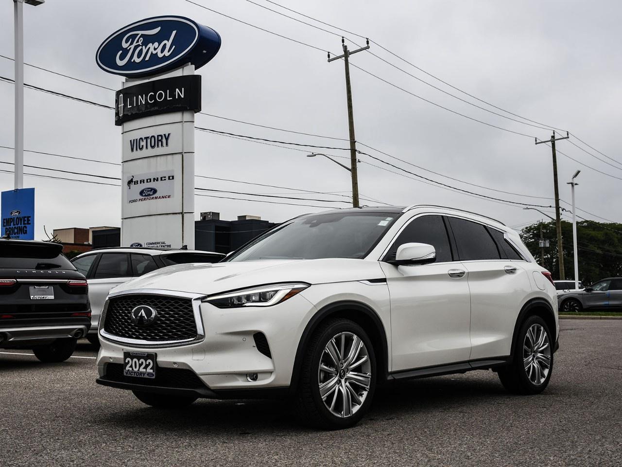 <h2>NOW AVAILABLE AT VICTORY FORD LINCOLN</h2><h1>2022 INFINITI QX50 Sensory AWD</h1><h3>Sensory Trim  Intelligent All-Wheel Drive  Premium Leather Interior  Luxury Compact SUV</h3><p>This 2022 INFINITI QX50 Sensory AWD delivers refined luxury, confident performance, and sophisticated technology in a stylish compact SUV. Finished in White and equipped with the desirable Sensory trim, this QX50 combines premium comfort, distinctive design, and everyday versatility.</p><h3>POWER & PERFORMANCE</h3><ul><li><p>2.0L VC-Turbo® Variable Compression Turbocharged 4-Cylinder Engine</p></li><li><p>Continuously Variable Transmission (CVT)</p></li><li><p>Intelligent All-Wheel Drive (AWD)</p></li><li><p>268 Horsepower / 280 lb-ft Torque</p></li><li><p>Drive Mode Selector</p></li><li><p>Hill Start Assist</p></li></ul><h3>PACKAGE</h3><ul><li><p>Sensory Trim</p></li><li><p>Intelligent All-Wheel Drive</p></li><li><p>Premium Leather Interior</p></li><li><p>Heated and Ventilated Front Seats</p></li><li><p>Power Liftgate</p></li><li><p>Remote Engine Start System</p></li></ul><h3>EXTERIOR FEATURES</h3><ul><li><p>20" Aluminum-Alloy Wheels</p></li><li><p>White Exterior Finish</p></li><li><p>LED Headlights and Signature Lighting</p></li><li><p>Power Liftgate</p></li><li><p>Heated Power-Folding Exterior Mirrors</p></li><li><p>Dual Chrome Exhaust Finishers</p></li></ul><h3>INTERIOR & COMFORT</h3><ul><li><p>Semi-Aniline Leather Seating Surfaces</p></li><li><p>Heated and Ventilated Front Seats</p></li><li><p>10-Way Power Driver Seat with Memory</p></li><li><p>Dual-Zone Automatic Temperature Control</p></li><li><p>Heated Leather-Wrapped Steering Wheel</p></li><li><p>60/40 Split-Folding Rear Seats</p></li></ul><h3>TECHNOLOGY</h3><ul><li><p>INFINITI InTouch Dual Display System</p></li><li><p>9" Upper Touchscreen Display</p></li><li><p>Apple CarPlay® & Android Auto</p></li><li><p>Bose® Premium Sound System</p></li><li><p>Bluetooth® Hands-Free Connectivity</p></li><li><p>Around View® Monitor with Moving Object Detection</p></li></ul><h3>SAFETY & DRIVER ASSISTANCE</h3><ul><li><p>INFINITI Safety Shield® 360</p></li><li><p>Blind Spot Warning</p></li><li><p>Lane Departure Warning</p></li><li><p>Forward Emergency Braking with Pedestrian Detection</p></li><li><p>Rear Cross Traffic Alert</p></li><li><p>Predictive Forward Collision Warning</p></li><li><p>Around View® Monitor</p></li></ul><h3>HIGHLIGHTS</h3><ul><li><p>Sensory Trim</p></li><li><p>Intelligent All-Wheel Drive</p></li><li><p>2.0L VC-Turbo® Engine</p></li><li><p>Premium Semi-Aniline Leather Interior</p></li><li><p>Bose® Premium Audio</p></li><li><p>White Exterior Finish</p></li></ul><h3>Special Offer:</h3><p><strong>Peace of Mind Included:</strong> 3-Month Comprehensive Warranty (for vehicles under 10 years old & under 160,000 km) No-Haggle, Live Market Pricing  Transparent & Competitive All-Inclusive Pricing: Fees, Reconditioning, and Full Detailing Included (Taxes & Licensing Extra)</p><h4>Additional Details:</h4><p><strong>Keys:</strong> Standard with one key. Additional keys (if provided by the previous owner) included at no cost. Optional key purchases available upon request.</p><p><strong>Visit Victory Ford Lincoln Today</strong> Schedule your appointment to experience this exceptional vehicle.</p>