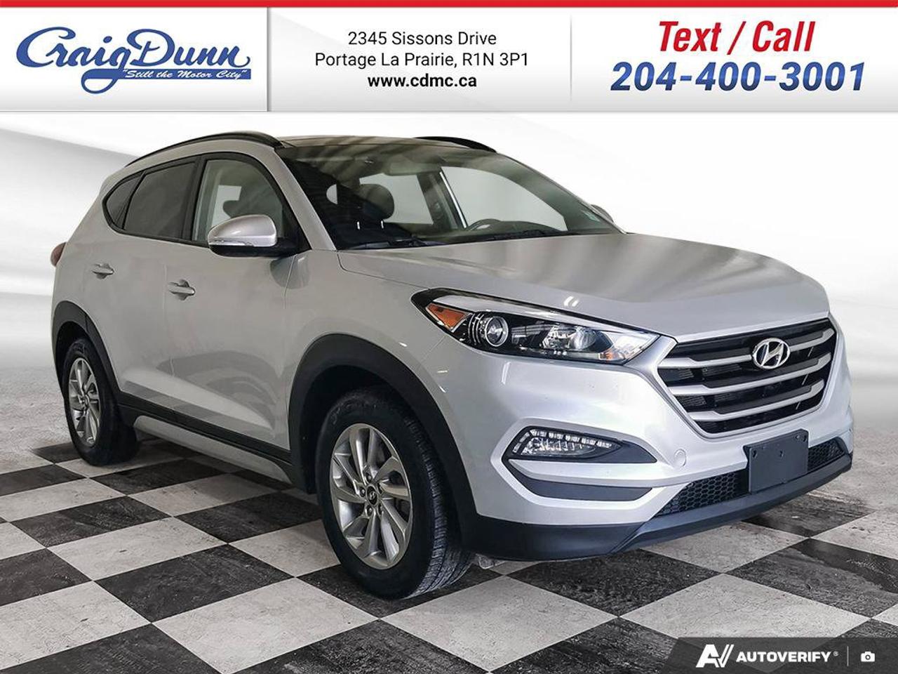 $0 Down. * PANORAMIC SUNROOF * HEATED STEERING WHEEL * Leather, Heated Seats, Remote Entry, Dual-Zone Automatic Climate Control, Bluetooth, XM Satellite Radio Ready, USB, Traction Control, Side Blind Zone Alert, Power Seat, 17 Aluminum Wheels feature this 2018 Hyundai Tucson SE AWD.  Text us at 204-400-3001 for more info!  Price does not include GST or PST.  We offer the most competitive finance rates through 13 banks and credit unions  Please read all ads carefully.