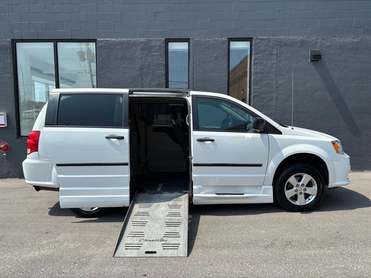<p>{ CERTIFIED PRE-OWNED }</p><p> 2016<span id=jodit-selection_marker_1787062806496_2805555436703969 style=line-height: 0; display: none; data-jodit-selection_marker=start></span> Dodge Grand Caravan 3.6L V6 BraunAbility Wheelchair Accessible Mobility Van &nbsp;One-owner Town of Midland&nbsp;van with NO ACCIDENTS. Powered by the reliable 3.6L V6 engine and automatic transmission, this Grand Caravan offers plenty of power, comfort and space while being equipped for wheelchair accessibility. It features a spacious and versatile interior, wheelchair-accessible entry, comfortable seating, air conditioning, power windows, power locks, power mirrors, cruise control, tilt steering, AM/FM/CD audio, ABS brakes, stability/traction control, multiple airbags and plenty of room for passengers, wheelchairs and mobility equipment. One owner, no accident history and its wheelchair-accessible setup, this is an excellent opportunity for someone looking for a dependable and practical mobility van. Low kilometres like this are hard to find, especially on a one-owner accessible van  come have a look and see it for yourself! </p><p>**THIS VEHICLE COMES FULLY CERTIFIED WITH A SAFETY CERTIFICATE & SERVICED AT NO EXTRA COST** #BEST DEAL IN TOWN! WHY PAY MORE ANYWHERE ELSE? COLISEUM AUTO SALES ON WESTON 301 WESTON ROAD TORONTO, ON M6N 3P1 4 1 6 - 7 6 6 - 2 2 7 7</p>
