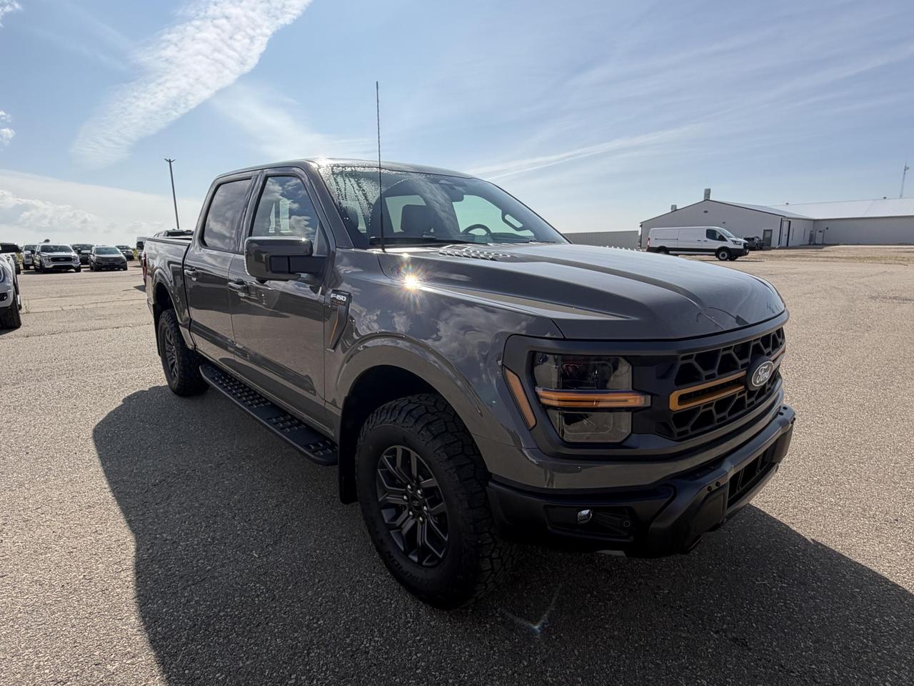 The 2026 Ford F-150 Tremor is built for those who demand capability without compromise. With a 3.5L V6 EcoBoost engine, off-road suspension, all-terrain tires, and a rugged Marsh Grey exterior, this Tremor is ready for whatever the job site or trail throws at it  all with Employee Pricing in effect right now.

- Engine: 3.5L V6 EcoBoost with 4WD and Electronic Transfer Case for serious off-road and towing capability
- Off-Road Suspension with Double Wishbone front and HD gas-pressurized shocks for a confident, controlled ride on any terrain
- Tires: 275/70R18 All-Terrain on 18 Dark Matte Finish Alloy Wheels  purpose-built for Tremor duty
- 3 Skid Plates for undercarriage protection when the pavement ends
- Class IV Towing Equipment with Trailer Sway Control and a 771 kg maximum payload rating
- Aerial View Camera System plus Left and Right Side Cameras for complete visibility on and off-road
- BLIS Blind Spot Monitoring, Cross-Traffic Alert with Reverse Brake Assist, and Ford Co-Pilot360 safety suite
- Packages include Tough Bed Spray-In Bedliner, Wheel Well Liners, Tray Style Floor Liners, and Engine Block Heater  ready for Canadian conditions year-round

Merit Ford Sales invites you to experience this Tremor firsthand. Reserve it online, start your purchase, or book a test drive today  and take advantage of Employee Pricing before its gone.