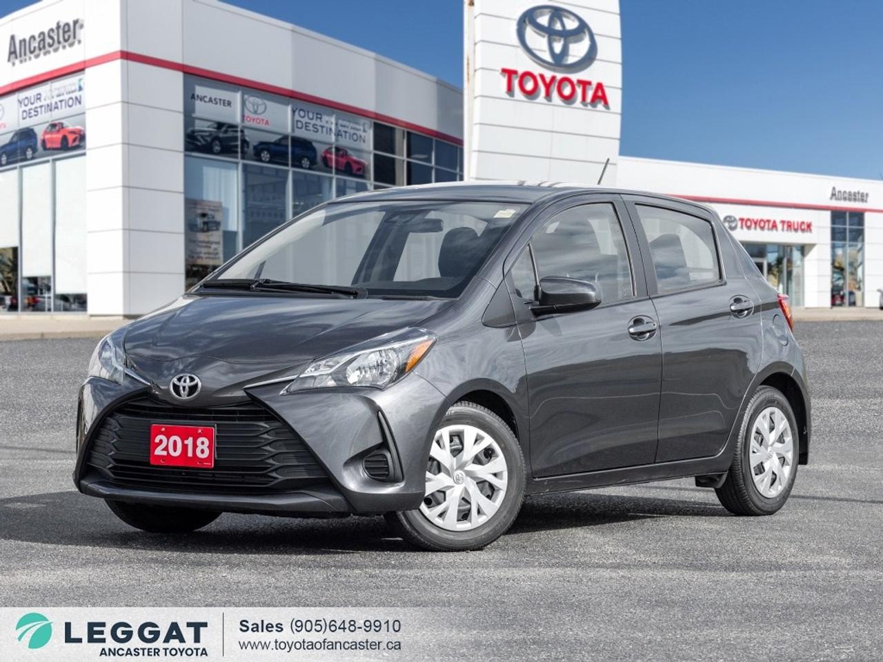 Discover efficient performance and everyday practicality with the 2018 Toyota Yaris LE. Finished in a bold Grey exterior colour complemented by premium cloth seating across its spacious cabin, standing on 15-inch steel wheels with wheel covers. Beneath the hood, youll find a 1.5 L 4-cylinder engine paired with a 4-speed automatic transmission and front-wheel drive. Step inside and be impressed to find features including Bluetooth hands-free connectivity, USB input, air conditioning, power windows and door locks, cruise control, and so much more! Dont miss your chance to take home this 2018 Toyota Yaris LE! SCHEDULE A TEST DRIVE TODAY! With our No-Haggle, No-Hassle purchase experience you get peace of mind knowing our best price is upfront.1-Guaranteed Minimum 50% Remaining Tire Tread Life2-Guaranteed Minimum 50% Life Remaining on Brakes3-120 Point Safety Inspection4-Free Carfax Canada Vehicle History Report5-Complete Lube, Oil, & Filter Change6-Full Detailed Clean UpAncaster Toyota is the proud recipient of the latest, highest honour for Canadian Toyota Retailers, the Toyota Presidents Award for Excellence in Customer Satisfaction, Sales, and Service! We are serving Ancaster, Hamilton, Burlington, Dundas, Brantford, Stoney Creek, Grimsby, Oakville, Mississauga, Milton, Cambridge, Kitchener Waterloo, Cayuga, Caledonia, St. Catharines, Welland, Niagara and the entire GHA and GTAFinance Price Shown. The cash purchase price slightly exceeds the advertised finance price, as we receive incentives from banks when we finance vehicles, which we pass on to customers. Recognizing the high demand for vehicles, which can raise prices, we utilize these incentives to lower the finance purchase price. Dealer reserves the right to decline cash purchases (cash, bank draft, certified cheque, credit card payments in excess of $1,000) at its sole and exclusive discretion. For Finance and Lease purchases Dealer charges a $999 finance/lease fee. While every reasonable effort is made to ensure the accuracy of all information on this site, we are not responsible for any errors or omissions. Please verify any information in question with a dealership sales manager prior to purchase. See dealer for full details.