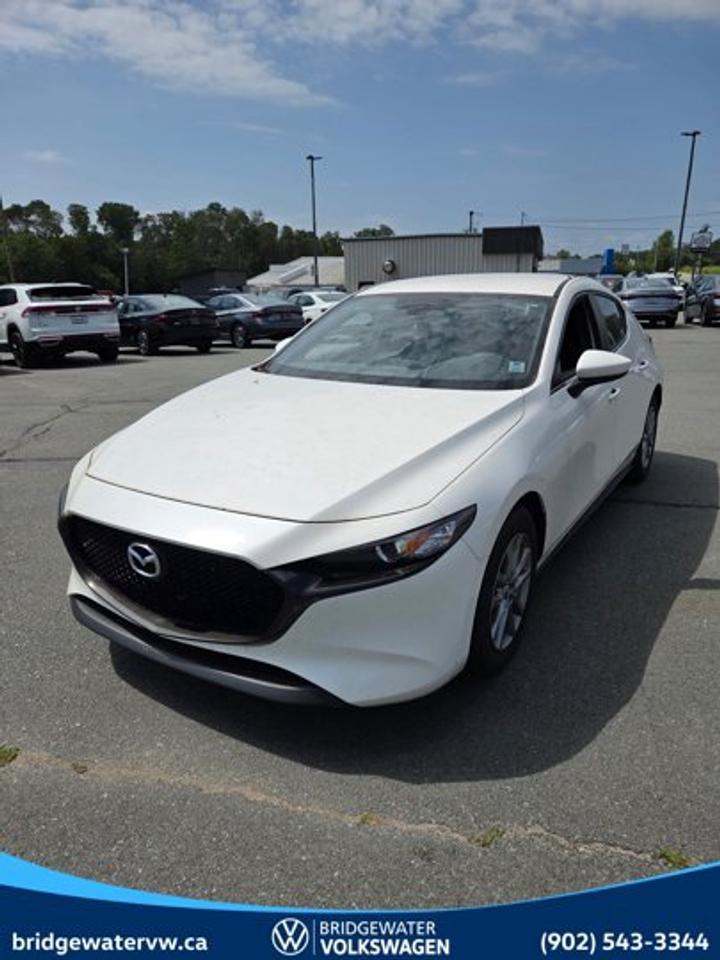 Recent Arrival! 2023 Mazda Mazda3 GXFWD | Apple CarPlay | Android Auto | Sirus XM Certified.This vehicle is a Steele Certified Pre-Owned Vehicle, offering added confidence through enhanced inspection standards and dealership-backed benefits. Steele Certified Reconditioning Process: Comprehensive multi-point inspection Mechanical and cosmetic reconditioning completed as needed Brake, tire, and battery assessment Professional detailing Final quality control road test Steele Certified Pre-Owned vehicles include additional ownership benefits. Any concerns related to the certification process must be reviewed and addressed by the original selling dealer.CARFAX Canada No Reported AccidentsSilver Metallic FWD 6-Speed SKYACTIV®-G 2.0L 4-Cylinder DOHC 16V 4-Wheel Disc Brakes, 8 Speakers, ABS brakes, Air Conditioning, Alloy wheels, AM/FM radio, AppLink/Apple CarPlay and Android Auto, Brake assist, Bumpers: body-colour, Cloth Upholstery, Compass, Delay-off headlights, Driver door bin, Driver vanity mirror, Dual front impact airbags, Dual front side impact airbags, Electronic Stability Control, Emergency communication system: Mazda Connected Services Private eCall (2-year trial subscription included), Exterior Parking Camera Rear, Front anti-roll bar, Front Bucket Seats, Front reading lights, Front wheel independent suspension, Fully automatic headlights, Heated front seats, Heated Front Seats (3 Settings), Illuminated entry, Knee airbag, Low tire pressure warning, Occupant sensing airbag, Outside temperature display, Overhead airbag, Overhead console, Panic alarm, Passenger door bin, Passenger vanity mirror, Power door mirrors, Power steering, Power windows, Radio data system, Radio: AM/FM/HD Audio System, Rain sensing wipers, Rear side impact airbag, Rear window defroster, Rear window wiper, Remote keyless entry, Speed control, Speed-sensing steering, Split folding rear seat, Steering wheel mounted audio controls, Tachometer, Telescoping steering wheel, Tilt steering wheel, Traction control, Trip computer, Turn signal indicator mirrors, Variably intermittent wipers, Wheels: 16 Silver Metallic Finish Alloy.