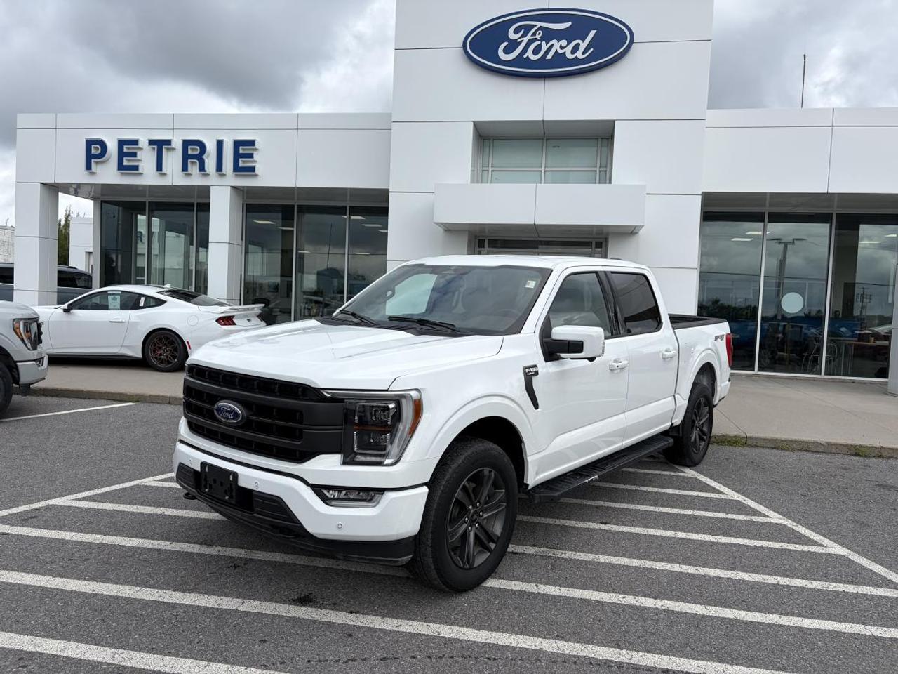 Built Ford tough! Here is a 2023 Ford F-150 Lariat. Powered by a 2.7L ecoboost engine with an electronic 10-speed automatic transmission that delivers legendary performance and towing capability. The 2023 Ford F-150 Lariat is a powerful pickup truck designed to tackle every job. Everything you expect from a truck and more, check out the 2023 Ford F-150 Lariat today! Key Features: >> Equipment group 502A >> Trailer tow package >> B&O unleashed sound system >> Lariat sport package >> Trailer brake controller >> 12 inch productivity screen >> Universal garage door opener >> Leather trimmed seats >> Reverse sensing system >> 360 degree camera >> Fully boxed steel frame >> Power tailgate lock >> Lane keeping system >> Tire pressure monitoring system >> Pickup box tie down hooks >> Tow hooks >> Boxlink cargo management system >> FORDPASS CONNECT and so much more! This 2023 Ford F-150 Lariat is available now at Petrie Ford. We are located at 1388 Bath Road in Kingston, Ontario. Come schedule a test drive today!
