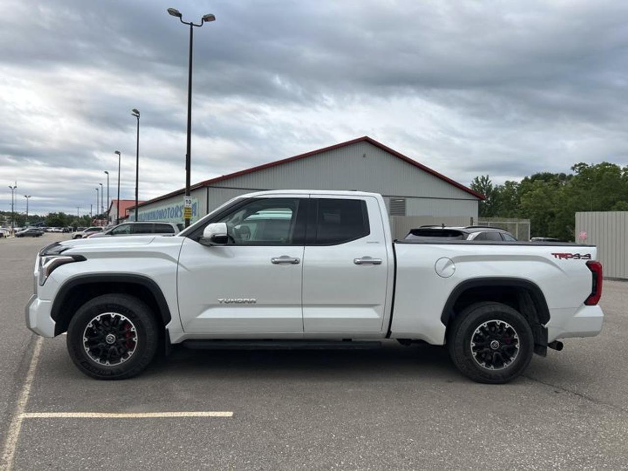 // ACCIDENT FREE!! //<br /><br />Built to handle hard work and daily driving with equal ease, this 2022 Toyota Tundra Limited TRD Off Road Double Cab 6.5 Box 4x4 brings strong turbo power, a premium cabin, and proven truck capability. Finished in White with a Black interior, it has 112,500 km, four doors, automatic transmission, and the confidence of an accident-free history.<br /><br />At Haldimand Motors Ltd. in Cayuga, this used Toyota pickup stands out for drivers who want comfort, towing strength, and modern tech in one well-rounded package. The 2022 Toyota Tundra Limited TRD Off Road Double Cab 6.5 Box 4x4 is a smart fit for work, travel, and weekend hauling.<br /><br />FEATURES OF THE Tundra Limited TRD Off Road Double Cab 6.5 Box 4x4 | No Accidents<br />   White exterior with bold truck presence<br />   Black interior with upscale cabin feel<br />   Double Cab with four full doors<br />   Sunroof adds open-air driving enjoyment<br /><br />TRUCK FEATURES<br />   Tows up to 5,034 kg confidently<br />   Trailer hitch ready for heavy hauling<br />   Trailer brake controller aids towing control<br />   Rear tow hook supports recovery needs<br /><br />ADVANCED SAFETY FEATURES<br />   Blind spot monitor boosts lane awareness<br />   Lane departure warning helps prevent drift<br />   Backup camera supports easier reversing<br />   Anti-lock brakes enhance stopping control<br /><br />PERFORMANCE AND EFFICIENCY<br />   3.4-litre gas engine delivers strong output<br />   Automatic transmission shifts smoothly every drive<br />   Four-wheel drive adds year-round traction<br />   Limited slip differential improves off-road grip<br /><br />COMFORT AND CONVENIENCE<br />   Heated front seats add cold-weather comfort<br />   Ventilated front seats help summer drives<br />   Dual-zone climate control keeps balance<br />   Remote starter adds everyday convenience<br /><br />TECHNONOLGY AND CONNECTIVITY<br />   Apple CarPlay keeps apps within reach<br />   Android Auto supports easy smartphone access<br />   Navigation system helps guide every trip<br />   Bluetooth integration supports hands-free communication<br /><br />CARGO SPACE<br />   6.5-foot box supports larger loads<br />   Rear trunk access adds useful flexibility<br />   Double Cab stores gear behind front seats<br />   Spare tire helps on longer trips<br /><br />AWARDS & RECOGNITIONS<br />   North American Truck of the Year, 2022<br />   Best Full-Size Truck, AutoTrader, 2022<br /><br />WHAT OTHER OWNERS LIKE<br />   Strong towing ability for trailers and toys<br />   Comfortable ride for daily truck use<br />   Easy-to-use tech and clear displays<br />   Confident power from turbocharged engine<br /><br />This Tundra is equipped with many features drivers value every day. Highlights include cruise control, power steering, power windows, heated mirrors, electric mirrors, retractable mirrors, tinted windows, and automatic door locks. Push button start and an auto-dimming rearview mirror add easy convenience on busy days.<br /><br />Comfort is a big part of this trucks appeal. You also get memory seats, drivers seat lumbar support, passenger lumbar support, a power drivers seat, power passenger seat, front air conditioning, automatic climate control, and a heated steering wheel. Ambient lighting helps give the cabin a refined feel after dark.<br /><br />For visibility and awareness, this Toyota includes LED headlamps, fog lights, automatic headlights, turn signal mirrors, a rear window defroster, tire pressure monitoring, and a 360-degree camera. Adaptive cruise control helps reduce stress on longer highway drives, while stability control supports secure handling in changing road conditions.<br /><br />Entertainment and media are well covered too. Satellite radio, HD Radio, and steering wheel audio controls keep key functions close at hand. The sunroof brings extra light into the cabin, while the black interior gives this truck a clean, upscale look that suits both work and family use.<br /><br />This 2022 Toyota Tundra Limited TRD Off Road Double Cab 6.5 Box 4x4 | No Accidentss VIN is: 5TFJA5DA4NX003905.<br /><br />WHY CHOOSE US? <br /><br />Honest & Transparent Buying Experience: Weve been a trusted name in business since 1984.<br /><br />STRAIGHTFORWARD PRICING:<br />Our Advertised Price Includes:<br />>>Safety Certification (No separate fee!)<br />>>30-Day 100% Mechanical Warranty<br />>>FREE Carfax History Report.<br />>>No upcharge for paying cash.<br />(Prices Exclude HST and Licensing Fees only.)<br /><br />>>Browse 300+ vehicles all in ONE LOCATION<br /><br />EASY FINANCING: Great rates & open loans<br /><br />WE BUY CARS: Get Top Dollar for your trade-in, or sell us your vehicle for CASH! Even if you dont buy from us!<br /><br />STOP BY TODAY<br />Treat yourself - stop by Haldimand Motors Ltd. located at 42 Talbot St E, Cayuga, ON N0A 1E0 to make this car yours today!<br /><br />https://www.haldimandmotors.com/used/stock-461054.html