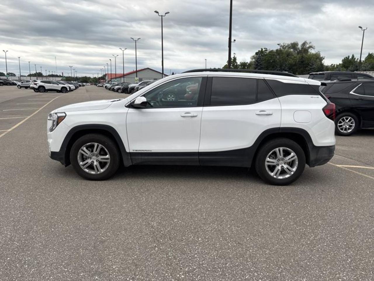 // ACCIDENT FREE!! //<br /><br />With confident style and everyday practicality, this 2022 GMC Terrain SLE AWD is a smart compact SUV for drivers who want comfort, traction, and modern tech in one well-rounded package. Finished in White with a Black interior, this used GMC Terrain SLE AWD offers four doors, automatic transmission, and a fuel-friendly 1.5-litre gas engine.<br /><br />This 2022 GMC Terrain SLE AWD has travelled 97,312 km and is ready for daily commuting, family errands, and weekend road trips from Cayuga and beyond. The panoramic sunroof adds an open, airy feel, while all-wheel drive brings extra confidence when weather and road conditions change across Ontario.<br /><br />FEATURES OF THE Terrain SLE AWD | No Accidents | Pano. Sunroof<br /><br />   Panoramic sunroof brightens every drive beautifully<br />   All-wheel drive adds year-round road confidence<br />   1.5-litre engine balances power and efficiency<br />   Remote starter adds welcome cold-weather comfort<br /><br />ADVANCED SAFETY FEATURES<br /><br />   Backup camera supports easier reversing and parking<br />   Lane departure warning helps maintain direction<br />   Anti-lock braking system supports controlled stopping<br />   Stability control adds confidence on slick roads<br /><br />This 2022 GMC Terrain SLE AWD is equipped with key safety features that help support peace of mind on busy streets and highways. Airbags for driver, passenger, side impact, and head protection add another layer of reassurance for you and your passengers on every trip.<br /><br />PERFORMANCE AND EFFICIENCY<br /><br />   1.5-litre gas engine delivers balanced performance<br />   Automatic transmission provides smooth everyday shifting<br />   All-wheel drive improves traction in poor weather<br />   Adaptive cruise control supports relaxed highway travel<br /><br />Built for real Canadian driving, this 2022 GMC Terrain SLE AWD blends responsive road manners with practical efficiency. Its compact SUV size makes it easy to handle in town, while the automatic transmission and dual shift mode help deliver a smooth and composed feel behind the wheel.<br /><br />COMFORT AND CONVENIENCE<br /><br />   Heated front seats add winter comfort<br />   Dual-zone climate control helps personalize temperature<br />   Drivers power seat aids easy adjustment<br />   Push button start simplifies daily departures<br /><br />Inside, this 2022 GMC Terrain SLE AWD offers a clean and functional cabin designed for everyday ease. The panoramic sunroof brings in more natural light, while front air conditioning, automatic climate control, tinted windows, and drivers lumbar support help make longer drives more comfortable.<br /><br />TECHNONOLGY AND CONNECTIVITY<br /><br />   Apple CarPlay keeps apps within reach<br />   Android Auto adds easy smartphone integration<br />   Bluetooth integration supports hands-free communication<br />   WiFi hotspot keeps passengers more connected<br /><br />Technology in this 2022 GMC Terrain SLE AWD is focused on convenience and simple access. Steering wheel audio controls, satellite radio, and a power outlet help make each drive more enjoyable, whether you are commuting through town or heading out on a longer highway trip.<br /><br />CARGO SPACE<br /><br />   Rear trunk access makes loading easier<br />   Four-door layout improves passenger entry convenience<br />   Spare tire adds practical travel readiness<br />   Flexible cargo area suits daily errands<br /><br />The cargo area in this 2022 GMC Terrain SLE AWD is well suited for groceries, sports gear, and luggage. Its SUV design gives you the versatility needed for active routines, while the rear layout makes it easy to load and organize everyday items.<br /><br />AWARDS & RECOGNITIONS<br /><br />   Top Safety Pick, Insurance Institute for Highway Safety, 2022<br /><br />WHAT OTHER OWNERS LIKE<br /><br />   Comfortable ride quality for daily driving<br />   Easy-to-use infotainment and phone connectivity<br />   Heated seats and remote start convenience<br />   Useful cargo room for active lifestyles<br /><br />This 2022 GMC Terrain SLE AWD stands out with accident-free history, practical all-wheel drive capability, and a strong list of everyday features. For drivers shopping at Haldimand Motors Ltd. in Cayuga, it delivers the comfort, technology, and utility that make a compact SUV such a popular choice.<br /><br />This 2022 GMC Terrain SLE AWD | No Accidents | Pano. Sunroofs VIN is: 3GKALTEV5NL274889.<br /><br />WHY CHOOSE US? <br /><br />Honest & Transparent Buying Experience: Weve been a trusted name in business since 1984.<br /><br />STRAIGHTFORWARD PRICING:<br />Our Advertised Price Includes:<br />>>Safety Certification (No separate fee!)<br />>>30-Day 100% Mechanical Warranty<br />>>FREE Carfax History Report.<br />>>No upcharge for paying cash.<br />(Prices Exclude HST and Licensing Fees only.)<br /><br />>>Browse 300+ vehicles all in ONE LOCATION<br /><br />EASY FINANCING: Great rates & open loans<br /><br />WE BUY CARS: Get Top Dollar for your trade-in, or sell us your vehicle for CASH! Even if you dont buy from us!<br /><br />STOP BY TODAY<br />Treat yourself - stop by Haldimand Motors Ltd. located at 42 Talbot St E, Cayuga, ON N0A 1E0 to make this car yours today!<br /><br />https://www.haldimandmotors.com/used/stock-461053.html