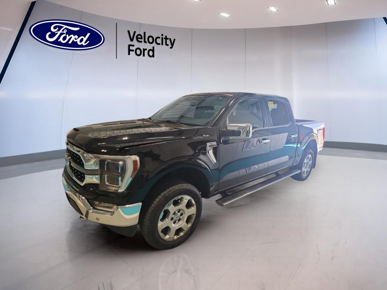 // ACCIDENT FREE!! //

Built for drivers who want premium comfort and real truck strength, this 2022 Ford F-150 King Ranch 4WD SuperCrew 5.5 Box is ready for work and travel in Moose Jaw. CARFAX Canada reports no accident, giving you added peace of mind with this used pickup.

Finished in Black with a Brown interior, this 2022 Ford F-150 King Ranch 4WD SuperCrew 5.5 Box blends upscale style with everyday utility. It has 136,411 km, a 5.0-litre unleaded engine, automatic transmission, four full doors, and confident four-wheel drive for changing Prairie conditions.

FEATURES OF THE F-150 King Ranch 4WD SuperCrew 5.5 Box

»» Premium King Ranch trim with upscale feel
»» 5.0-litre V8 power for strong response
»» SuperCrew cab adds roomy rear seating
»» 5.5-foot box supports daily truck duties

TRUCK FEATURES

»» Towing capacity rated at 4,717 kg
»» Four-wheel drive adds traction on loose surfaces
»» Rear tow hook supports truck utility
»» Power retractable running boards aid entry

ADVANCED SAFETY FEATURES

»» Backup camera helps with reversing confidence
»» Blind spot monitor supports lane awareness
»» Lane departure warning adds extra security
»» Stability control helps maintain road grip

PERFORMANCE AND EFFICIENCY

»» 5.0-litre engine delivers proven V8 capability
»» Automatic transmission provides smooth gear changes
»» Four-wheel drive helps in rough conditions
»» Off-road tires support traction on trails

COMFORT AND CONVENIENCE

»» Heated front seats improve cold weather comfort
»» Heated rear seats add passenger comfort
»» Dual-zone climate control keeps temperatures balanced
»» Memory seats simplify daily driver settings

TECHNOLOGY AND CONNECTIVITY

»» Navigation system helps guide every trip
»» Bluetooth integration supports hands-free communication
»» WiFi hotspot keeps devices better connected
»» Steering wheel audio controls ease operation

CARGO SPACE

»» 5.5-foot box handles daily hauling needs
»» SuperCrew cabin offers extra interior storage
»» Rear trunk access supports loading convenience
»» Spare tire adds confidence on longer drives

AWARDS & RECOGNITIONS

»» North American Truck of the Year, 2021
»» Best Full-Size Pickup, The Car Guide, 2022

WHAT OTHER OWNERS LIKE

»» Strong V8 performance for towing confidence
»» Spacious cabin with useful rear seating
»» Smooth ride for a full-size truck
»» Easy tech features for daily driving

This Ford pickup also includes many sought-after features that add comfort and ease to every drive. Highlights include cruise control, power steering, anti-lock braking system, child safety locks, driver and passenger airbags, side impact airbags, head side airbags, tire pressure monitoring, automatic headlights, fog lights, heated mirrors, electric mirrors, power windows, tinted windows, and automatic door locks.

Inside, this truck is well equipped for long days on the road. You will enjoy front air conditioning, automatic climate control, an adjustable steering wheel, adjustable pedals, driver lumbar support, passenger lumbar support, power driver seat, power passenger seat, auto-dimming rearview mirror, illuminated vanity mirrors, ambient lighting, push button start, and remote starter convenience.

Entertainment and visibility are also well covered in this 2022 Ford F-150 King Ranch 4WD SuperCrew 5.5 Box. It features satellite radio, HD Radio, LED headlamps, turn signal mirrors, rear window defroster, retractable mirrors, memory mirrors, leather steering wheel, and dual shift mode transmission. At Velocity Ford in Moose Jaw, this accident-free truck is a smart choice for drivers who want premium features and real Ford capability.

This 2022 Ford F-150 King Ranch 4WD SuperCrew 5.5 Boxs VIN is: 1FTFW1E55NFC27160 .