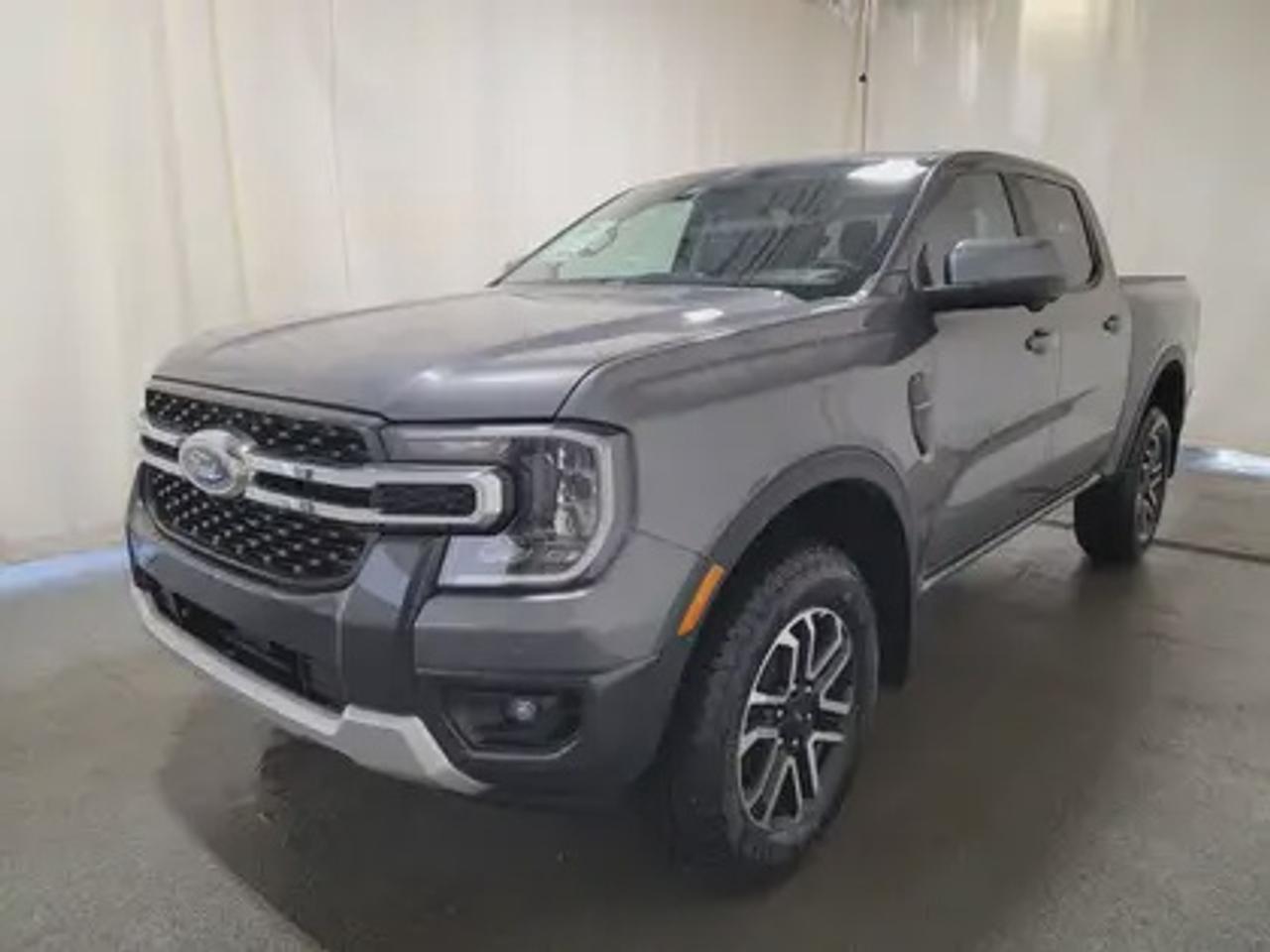 This all-new 2026 Ford Ranger Lariat 500A looks absolutely stunning in Carbonized Grey Matalic. This versatile compact pickup comes equipped with the 2.3L EcoBoost® engine, producing 270 horsepower and 310 lb-ft of torque. By leveraging EcoBoost® technology and a 10-speed automatic transmission, this truck is designed to achieve 11.2L/100 km (25 miles per gallon) combined highway/city fuel economy.

Key Features:
12 Centre Display
Dual Zone Temperature Control 
Rear Window W/Privacy Glass & Defrost
Ford Co-Pilot360
360 Degree Camera
Lane Keeping System 
Rear Parking Sensors
Adaptive Cruise Control and Speed Sign Recognition
Reverse Break Assist 
B&O® System by Bang & Olufsen with HD Radio
Intelligent Access with Push-Button Start
10-Way Power Drivers Seat 
Heated Front Seats 
18 Machined Aluminum Wheels
Cruise Control
Universal Garage Door Opener
FordPass Connect
Selectable Drive Modes
12 Cluster Display

The 2026 Ranger Lariat is built to handle Saskatchewans diverse driving conditions, offering both fuel efficiency and practical utility features like multiple Drive Modes: Normal, Eco, Sport, Tow/Haul, Slippery mode, Trailer Towing abilities, Auto high beam headlamps and cruise control. 

Bennett Dunlop Ford, proudly serving Regina for over 40 years, is conveniently located at 770 Broad Street. With over 3,500 Google reviews, our reputation reflects our commitment to providing a fast, easy, and enjoyable vehicle-buying experience. We eliminate the hassle with no admin or documentation fees, transparent upfront pricing that lets you shop with total confidence. But were more than just a dealershipwere driven to make a difference by supporting local community initiatives and events that matter to you. Visit Bennett Dunlop Ford today and experience why were Reginas trusted choice for quality vehicles, exceptional service, and a genuine commitment to driving change in our community!