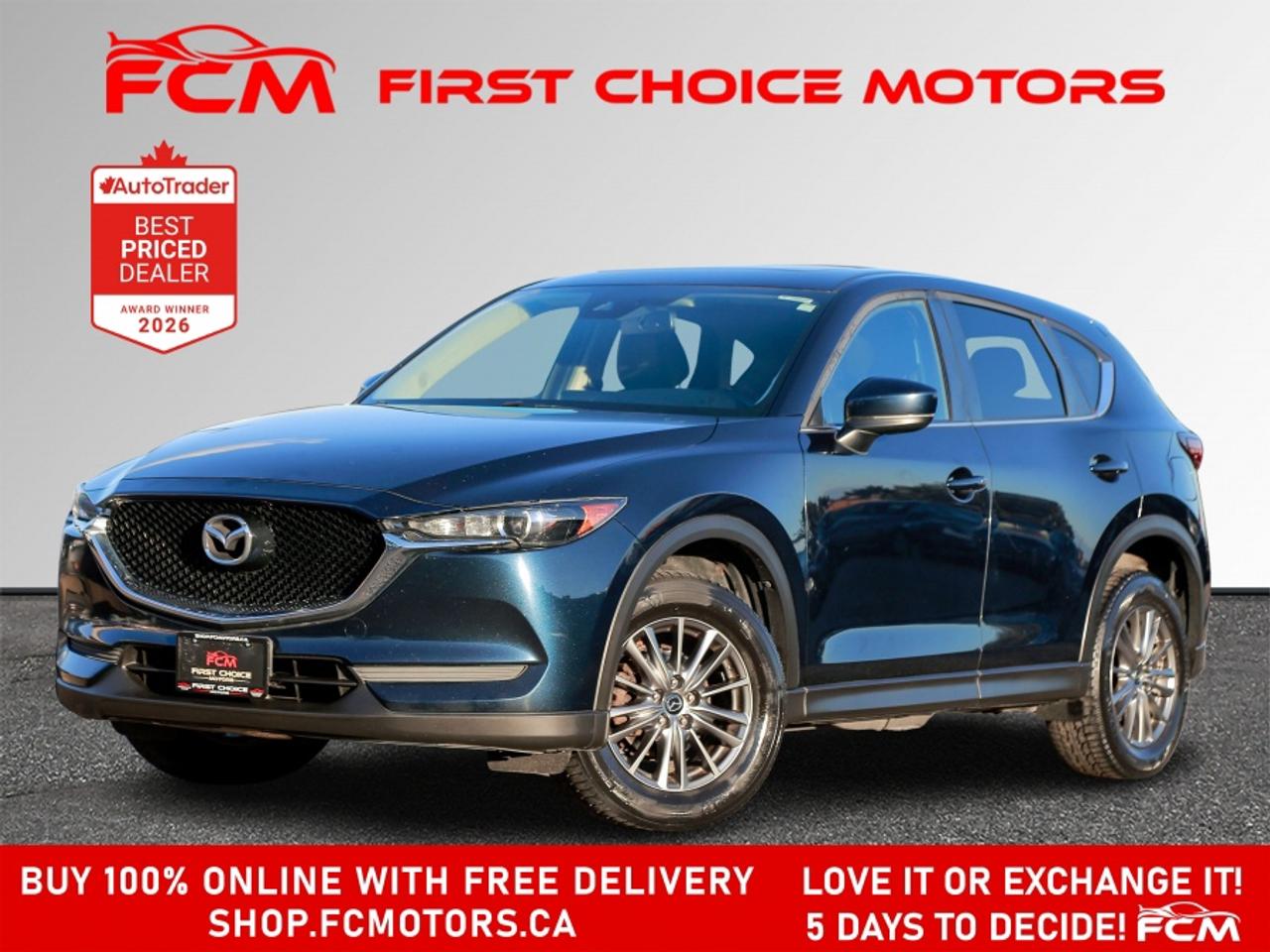 ** ** SPECIAL LIMITED TIME OFFER ** ** PURCHASE ANY VEHICLE THIS WEEK AND RECEIVE 4 BRAND-NEW ALL-SEASON TIRES AT NO ADDITIONAL COST!!! DON   T MISS THIS EXCLUSIVE CHANCE TO UPGRADE YOUR RIDE AND STAY PREPARED FOR ANY WEATHER!!! <br><br>EXCITING NEWS FROM FIRST CHOICE MOTORS! Our brand-new online showroom is now open to the public, bringing the ultimate car shopping experience right to your fingertips! Enjoy a 100% online car shopping experience, with over 500 certified vehicles in stock, comprehensive protection plans, and thousands of new auto parts & accessories available! Plus, for a limited time, were offering FREE deliveries across Ontario on all vehicle purchases! Dont miss out   visit Shop.fcmotors.ca to find and upgrade your perfect vehicle today!<br><br>Welcome to First Choice Motors, the largest car dealership in Toronto of pre-owned cars, SUVs, and vans priced between $5000-$15,000. With an impressive inventory of over 300 vehicles in stock, we are dedicated to providing our customers with a vast selection of affordable and reliable options. <br><br>Were thrilled to offer a used 2018 Mazda CX-5 GS Skyactiv, dark blue color with 156,000km (STK#10216) This vehicle was $17990 NOW ON SALE FOR $16990. It is equipped with the following features:<br>- Automatic Transmission<br>- Sunroof<br>- Heated seats<br>- Heated steering wheel<br>- All wheel drive<br>- Bluetooth<br>- Reverse camera<br>- Alloy wheels<br>- Power windows<br>- Power locks<br>- Power mirrors<br>- Air Conditioning<br><br>At First Choice Motors, we believe in providing quality vehicles that our customers can depend on. All our vehicles come with a 36-day guarantee on all safety related items. We also offer additional warranty options up to 5 years for our customers who want extra peace of mind.<br><br>Furthermore, all our vehicles are sold fully certified with brand new brakes rotors and pads, a fresh oil change, and brand new set of all-season tires installed & balanced. You can be confident that this car is in excellent condition and ready to hit the road.<br><br>At First Choice Motors, we believe that everyone deserves a chance to own a reliable and affordable vehicle. Thats why we offer financing options with low interest rates starting at 7.9% O.A.C. Were proud to approve all customers, including those with bad credit, no credit, students, and even 9 socials. Our finance team is dedicated to finding the best financing option for you and making the car buying process as smooth and stress-free as possible.<br><br>Our dealership is open 7 days a week to provide you with the best customer service possible. We carry the largest selection of used vehicles for sale under $9990 in all of Ontario. We stock over 300 cars, mostly Hyundai, Chevrolet, Mazda, Honda, Volkswagen, Toyota, Ford, Dodge, Kia, Mitsubishi, Acura, Lexus, and more. With our ongoing sale, you can find your dream car at a price you can afford. Come visit us today and experience why we are the best choice for your next used car purchase!<br><br>All prices include $22.00 OMVIC Fee.  Excludes, license plates, ownership registration and ONTARIO HST (13%)<br>*No Credit Card payments can be accepted for Vehicle Purchases*