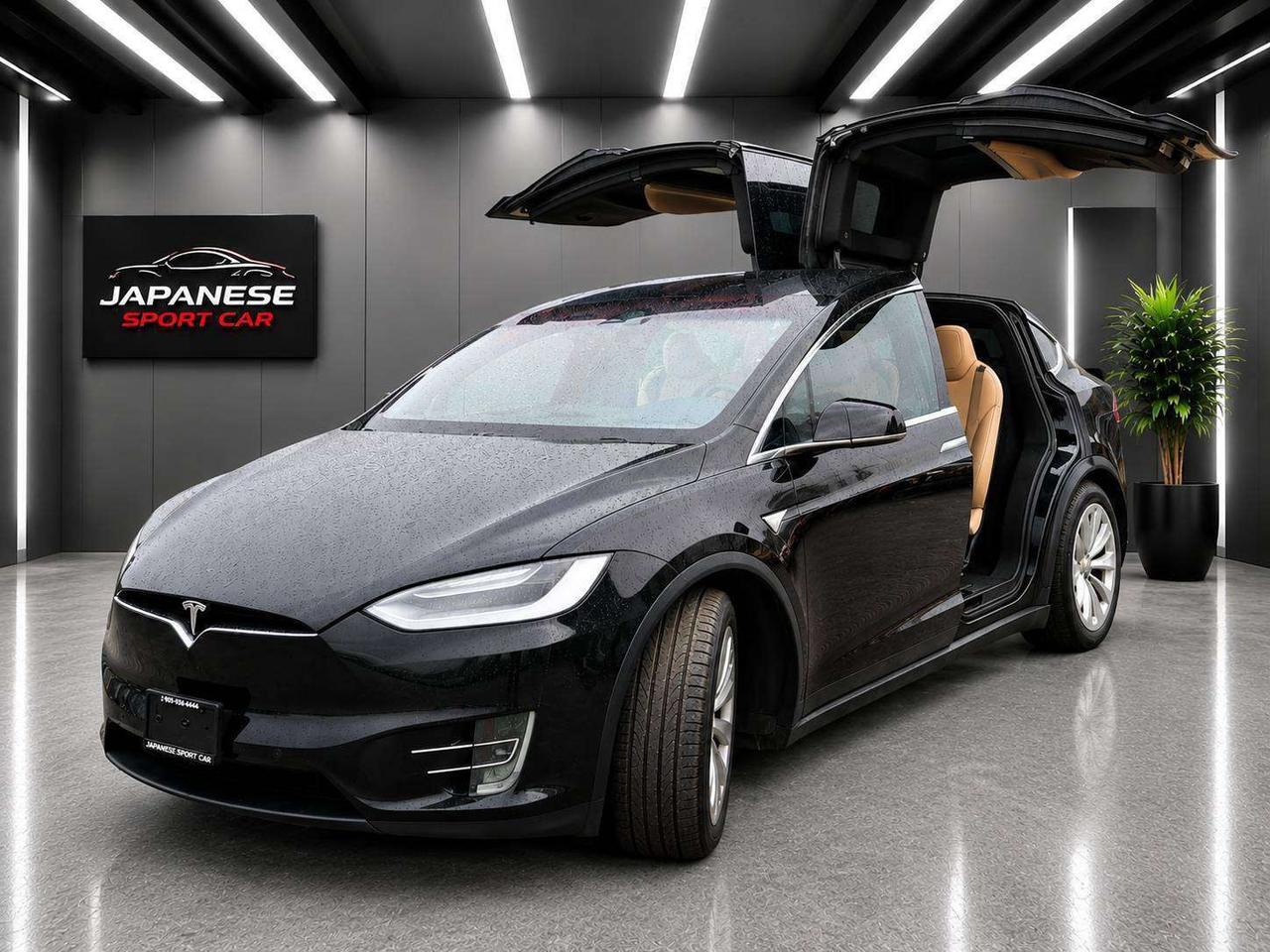 Safety, Trades are welcome. Need financing? No problem, we deal with many financial companies that can help buyers finance the vehicle they want! Any credit welcome. Japanese Sport Car has been serving Canadians for over 27 years, and we strive to provide the best service possible to customers all over Canada! We now offer FREE vehicle delivery anywhere in the Niagara Region! Buy Ahead And Pickup From Our Location Or Have It Shipped Directly To Your Door! Ask Us Today! BUY WITH CONFIDENCE! OMVIC & UCDA Registered dealer, specializing in Commercial Trucks for over 27 years!
Full Range: 407km
Full specs & features
2016 TESLA MODEL X 75D
Auto, AWD, Electric
286XXX KM
Black / Tan
Passengers: 7
Doors: 4
5YJXCAE28GF019459

Summon Feature
Traffic Aware Cruise Control/Autosteer
Air Type: Air Conditioning
Seat Covering Type: Leather
Adjustable Steering Wheel
Blind Spot Monitor
Front Collision Warning
Heated Seats
Power Steering
Radio Equipment: AM/FM
Vocal Assist Telematics
Navigation System
Power Windows, Locks, Mirrors, liftgate
Parking Distance Control
Roof Type: Sunroof/Moonroof
Drive Train - All Wheel
Side Both Air Bags

We offer a comprehensive Client Care Package for only $999 which includes a certified safety inspection and a full car detail. All prices do not include certification, applicable taxes (HST) and licensing fees. Without certification, as per OMVIC regulations, the vehicle is not road worthy or certified.

Warranty cost $5000 Battery (Main)       12 Months or 12,000 KM
Powertrain      $12,000                            12 Months or 12,000 KM