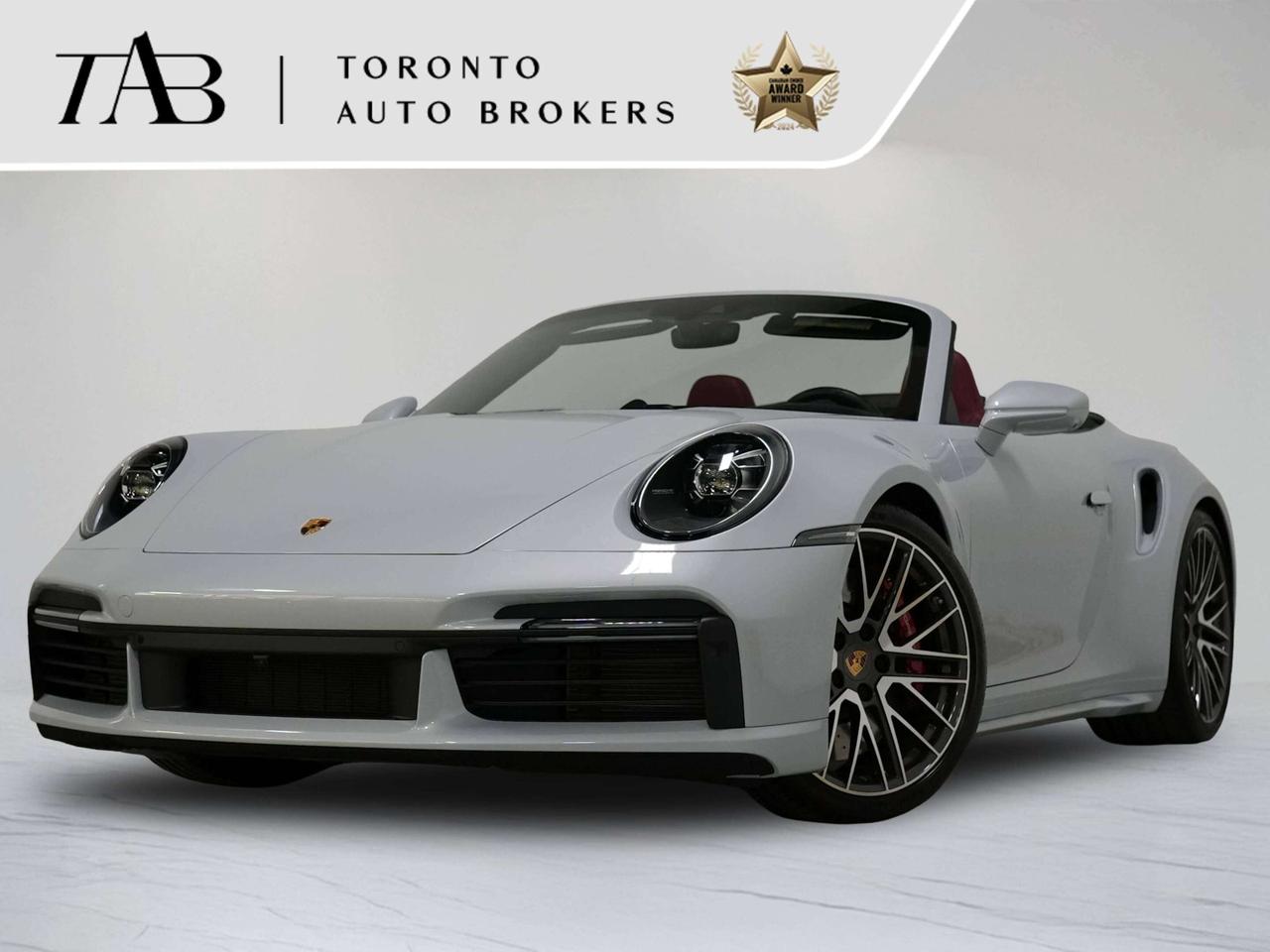 This stunning 2024 Porsche 911 Turbo Cabriolet is a local Ontario vehicle with a clean CARFAX report and remaining manufacturer warranty until June 12, 2028, or 80,000 km. and is equipped with an impressive selection of premium features and options. Powered by Porsche&rsquo;s legendary 3.7L Twin-Turbocharged Flat-6 engine, the 911 Turbo delivers exhilarating performance while maintaining the refinement and everyday usability Porsche is known for.

Standard & Featured Options Include:

3.7L Twin-Turbocharged Flat-6 Engine
Porsche Doppelkupplung (PDK) 8-Speed Transmission
All-Wheel Drive
Convertible Soft Top
Porsche Active Suspension Management (PASM)
Porsche Torque Vectoring Plus (PTV Plus)
Porsche Stability Management (PSM)
Porsche Communication Management (PCM)
Premium Plus Package
20" Porsche Alloy Wheels
LED Headlights
Power Sport Seats
Heated & Ventilated Front Seats
Leather Interior
Navigation System
Apple CarPlay

NOW OFFERING 3 MONTH DEFERRED FINANCING PAYMENTS ON APPROVED CREDIT. 

WE OFFER THE BEST FINANCE RATES, AND DONT CHARGE ANY FINANCING FEE 

Looking for a top-rated pre-owned luxury car dealership in the GTA? Look no further than Toronto Auto Brokers (TAB)! Were proud to have won multiple awards, including the 2024 AutoTrader Best Priced Dealer, the 2024 CarGurus Award, the 2025 Top Choice Award, the 2025 Consumer Satisfaction Award, the 2025 Canadian Choice Award, the 2025 Three Best Rated Dealer Award, and many more!

With 30 years of experience serving the Greater Toronto Area, TAB is a respected and trusted name in the pre-owned luxury car industry. Our 30,000 sq.Ft indoor showroom is home to a wide range of luxury vehicles from top brands like BMW, Mercedes-Benz, Audi, Porsche, Land Rover, Jaguar, Aston Martin, Bentley, Maserati, and more. And we dont just serve the GTA, were proud to offer our services to all cities in Canada, including Vancouver, Montreal, Calgary, Edmonton, Winnipeg, Saskatchewan, Halifax, and more.

At TAB, were committed to providing a no-pressure environment and honest work ethics. As a family-owned and operated business, we treat every customer like family and ensure that every interaction is a positive one. Come experience the TAB Lifestyle at its truest form, luxury car buying has never been more enjoyable and exciting!

We offer a variety of services to make your purchase experience as easy and stress-free as possible. From competitive and simple financing and leasing options to extended warranties, aftermarket services, and full history reports on every vehicle, we have everything you need to make an informed decision. We welcome every trade, even if youre just looking to sell your car without buying, and when it comes to financing or leasing, we offer same day approvals, with access to over 50 lenders, including all of the banks in Canada. Feel free to check out your own Equifax credit score without affecting your credit score, simply click on the Equifax tab above and see if you qualify.

Call us today or visit our website to learn more about our inventory and services. And remember, all prices exclude applicable taxes and licensing, and vehicles can be certified at an additional cost of $999.