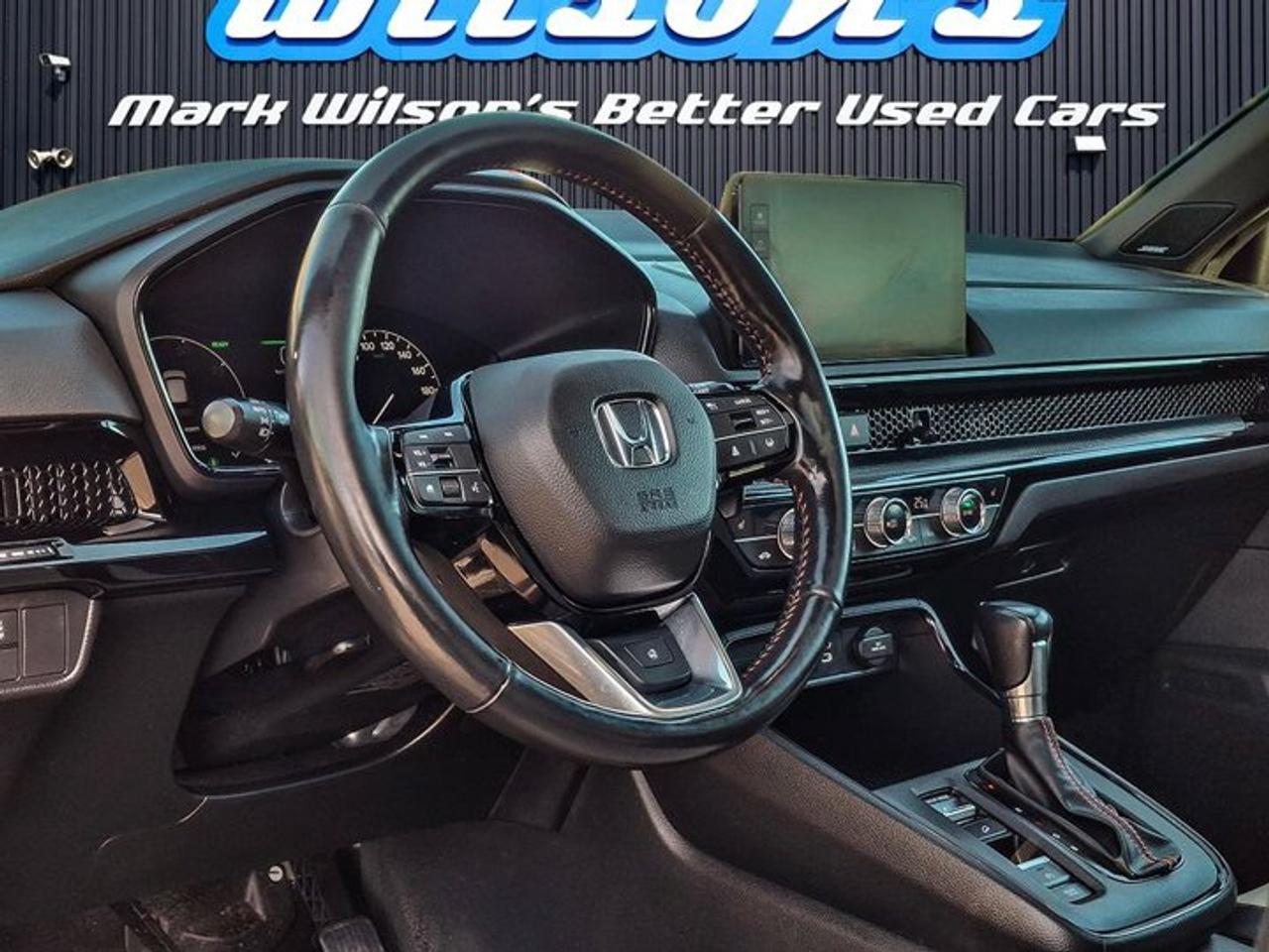 2024 Honda CR-V Hybrid Touring AWD | Leather | Sunroof | Nav | Bose | Adaptive Cruise | Heated Wheel + Seats | and More ! Photo