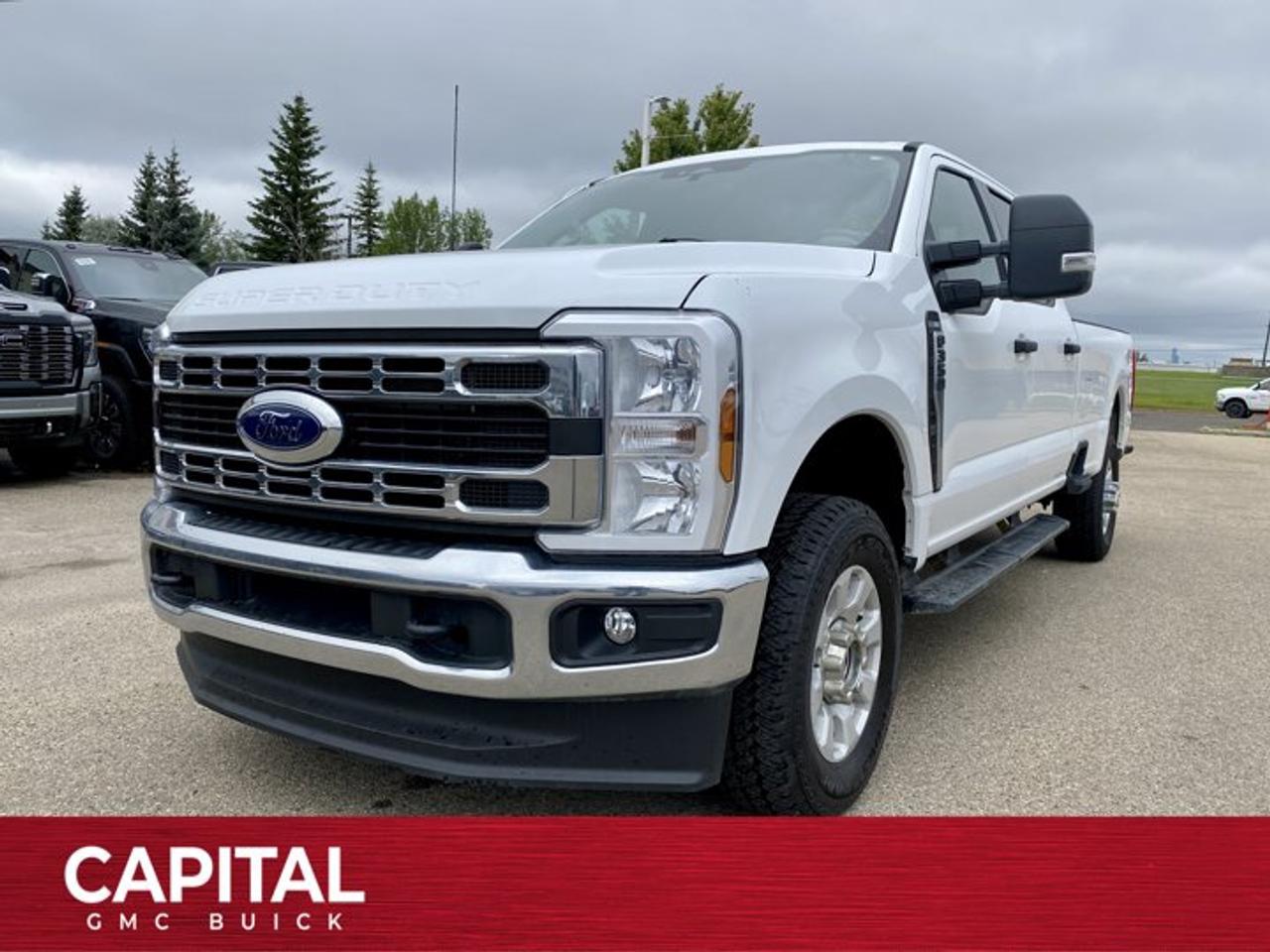 WHEELS: 18 SPARKLE SILVER PAINTED CAST ALUMINUM -inc: bright hub covers/centre ornaments (STD), TRANSMISSION: TORQSHIFT 10-SPEED AUTOMATIC -inc: SelectShift and selectable drive modes: normal, eco, slippery roads, tow/haul and off-road (STD), TIRES: LT275/65RX18E BSW A/S (5) -inc: Spare may not be the same as road tire (STD), ORDER CODE 613A, MEDIUM DARK SLATE, CLOTH 40/20/40 SPLIT BENCH SEAT W/RECLINE -inc: fold-down centre armrest w/2 cupholders, lift up centre-seat w/locking storage and 8-way power driver (includes power lumbar), ENGINE: 7.3L 2V DEVCT NA PFI V8 GAS (STD), ELECTRONIC-LOCKING W/3.73 AXLE RATIO (STD), AGATE BLACK METALLIC, Wireless Phone Connectivity, Wheels: 18 Sparkle Silver Painted Cast Aluminum -inc: bright hub covers/centre ornaments. This Ford Super Duty F-350 SRW has a dependable Regular Unleaded V-8 7.3 L engine powering this Automatic transmission.*This Ford Super Duty F-350 SRW XLT Has Everything You Want *Wheels w/Hub Covers, Variable Intermittent Wipers, Urethane Gear Shifter Material, Trip Computer, Transmission w/Driver Selectable Mode and Oil Cooler, Trailer Wiring Harness, T, Tire Specific Low Tire Pressure Warning, Tailgate/Rear Door Lock Included w/Power Door Locks, Tailgate Rear Cargo Access, SYNC 4 -inc: 8 LCD capacitive touchscreen w/swipe capability, wireless phone connection, cloud connected, AppLink w/app catalogue, 911 Assist, Apple CarPlay and Android Auto compatibility and digital owners manual, Steel Spare Wheel, Solid Axle Rear Suspension w/Leaf Springs, Smart Device Remote Engine Start, Smart Device Integration, Single Stainless Steel Exhaust, Side Impact Beams, Securilock Anti-Theft Ignition (pats) Immobilizer, Seats w/Cloth Back Material, Safety Canopy System Curtain 1st And 2nd Row Airbags.*Stop By Today *Youve earned this- stop by Capital GMC Buick of Edmonton located at 9751 34 Ave, Edmonton, AB T6E 5X9 to make this car yours today!