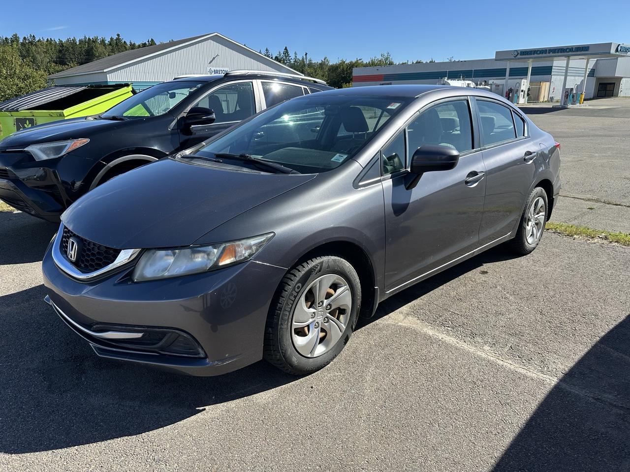 2015 Honda Civic 4dr Auto LX Photo0