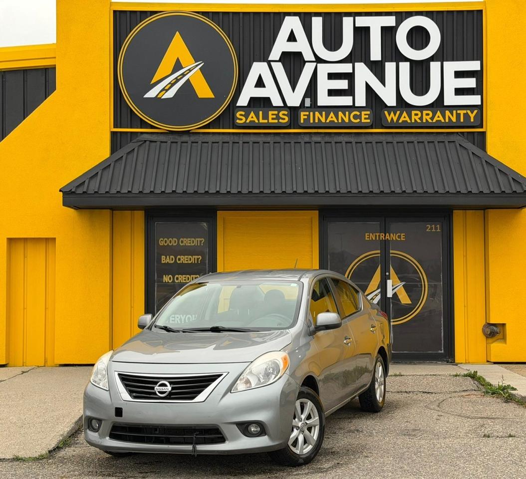 This outstanding example of a 2012 Nissan Versa 1.6 SV is proudly offered by Auto Avenue Airdrie. <br/> Rare, practical, and exceptionally well-preserved, this Nissan Versa 1.6 SV is a true standout. And no, its not a misprint - the odometer is accurate. This is a genuinely LOW-MILEAGE Nissan Versa, making it a rare find in todays market. <br/> The Nissan Versa is known for its practicality, reliability, and comfortable everyday driving experience, and this exceptional example brings all of those qualities together in one smart and versatile package. With its efficient 1.6L engine and easy-to-drive character, this Versa is perfectly suited for commuting, city driving, and everyday adventures. <br/> Finding a vehicle of this age with such low mileage is becoming increasingly uncommon. This 2012 Nissan Versa 1.6 SV offers a unique opportunity for someone looking for dependable transportation without compromising on value or character. <br/> There are plenty of vehicles on the market, but if youre looking for something practical, reliable, and truly SPECIAL, this Nissan Versa 1.6 SV deserves your attention. <br/> THIS IS THE ONE. GENUINELY LOW MILEAGE, NISSAN RELIABILITY, AND EXCEPTIONAL VALUE - A RARE FIND YOU DONT WANT TO MISS! <br/> AUTO AVENUE IS AN AMVIC LICENSED DEALERSHIP, COMMITTED TO PROVIDING EXCEPTIONAL SERVICE AND QUALITY VEHICLES WITH FLEXIBLE PAYMENT OPTIONS. <br/>