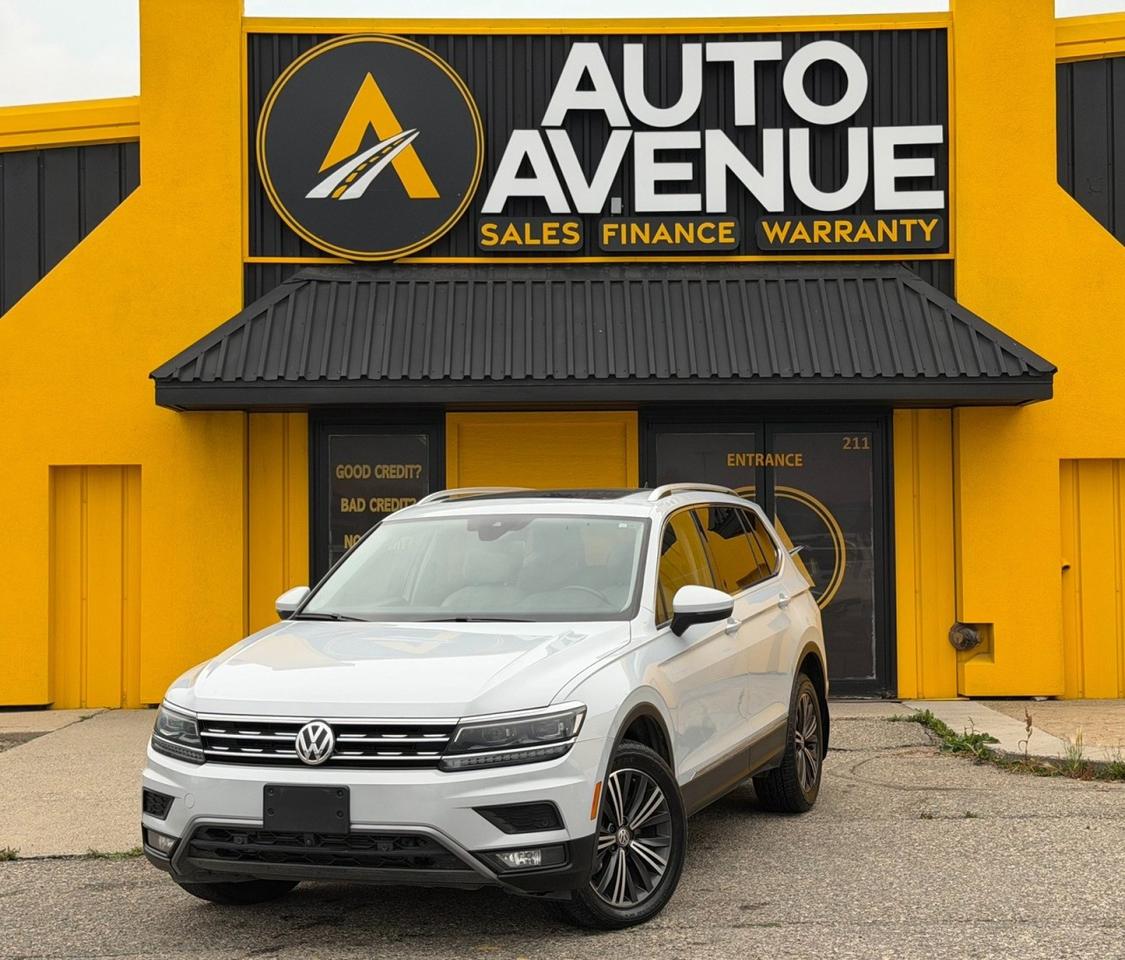This outstanding example of a 2018 Volkswagen Tiguan Highline is proudly offered by Auto Avenue Airdrie. <br/> Combining premium comfort, versatile capability, and sophisticated European design, this Volkswagen Tiguan Highline is an exceptional choice for families and drivers who expect more from their SUV. Featuring a PANORAMIC ROOF, LEATHER INTERIOR, and BACKUP CAMERA, this Tiguan is beautifully equipped for both everyday driving and weekend adventures. <br/> With AWD providing excellent traction, stability, and control, this 2018 Volkswagen Tiguan inspires confidence in virtually every driving condition. Whether youre navigating city streets, heading out on the highway, or taking on changing road conditions, this SUV delivers a smooth and composed driving experience. <br/> Step inside and experience the refined leather interior, where comfort, quality, and thoughtful technology come together beautifully. The integrated navigation system adds convenience to every journey, helping you stay confidently on course wherever the road takes you. <br/> The Volkswagen Tiguan Highline is the perfect combination of practicality, luxury, and driving enjoyment. With its premium features, spacious versatility, and unmistakable European character, this is an SUV youll be proud to drive. <br/> THIS IS THE ONE. AWD, PANORAMIC ROOF, LEATHER, BACKUP CAMERA, NAVIGATION, AND HIGHLINE LUXURY - EVERYTHING YOU WANT IN A PREMIUM SUV! <br/> AUTO AVENUE IS AN AMVIC LICENSED DEALERSHIP, COMMITTED TO PROVIDING EXCEPTIONAL SERVICE AND QUALITY VEHICLES WITH FLEXIBLE PAYMENT OPTIONS. <br/>