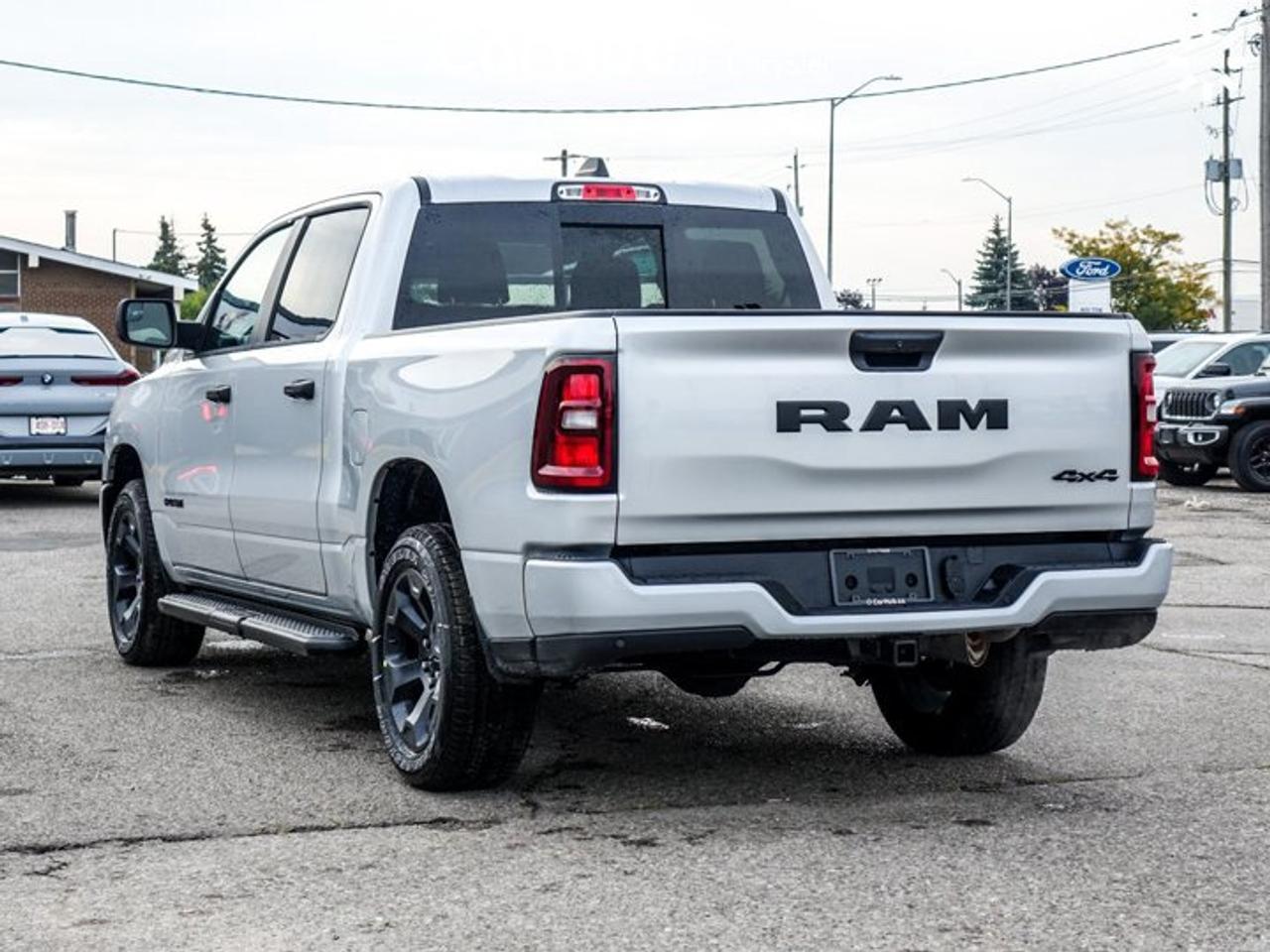 2027 RAM 1500 BLACK EXPRESS Crew Cab 5'7" Box 3.6L Pentastar V6 eTorque | Black Express Edition | Customer Preferred Package 23D | 20-Inch Wheels Photo