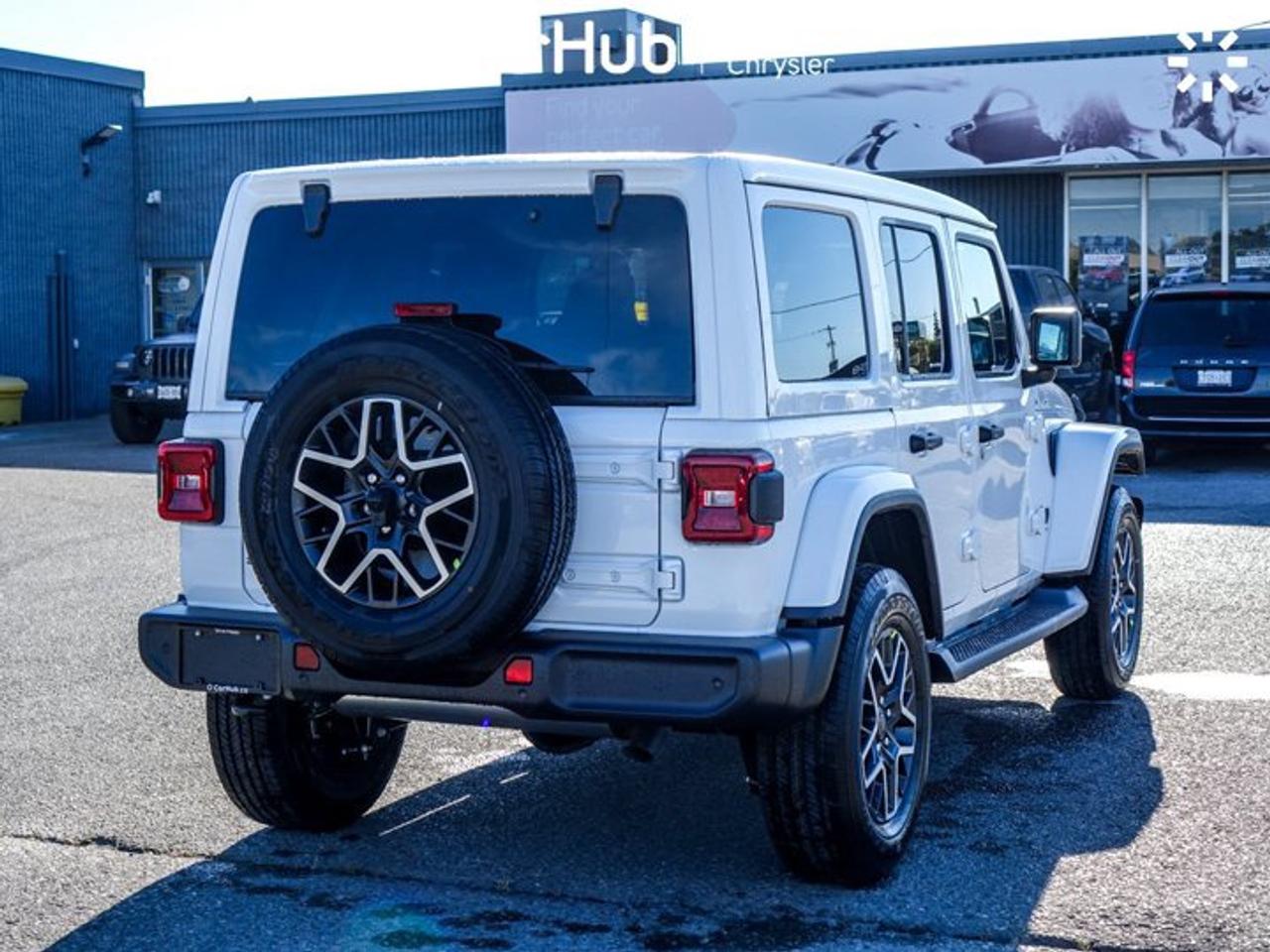 2027 Jeep Wrangler Sahar 2.0L Turbocharged I-4 | Sahara Popular Equipment Group | Sky One-Touch Power Top Photo