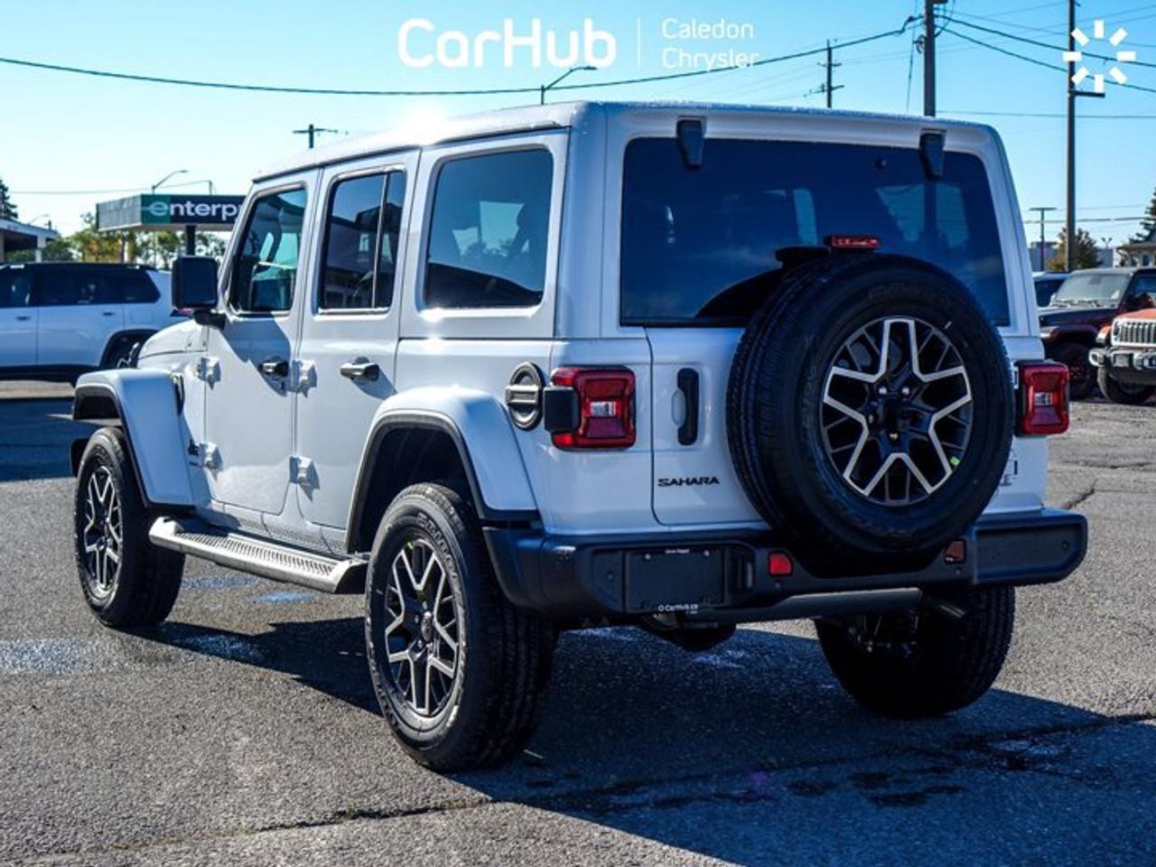 2027 Jeep Wrangler Sahar 2.0L Turbocharged I-4 | Sahara Popular Equipment Group | Sky One-Touch Power Top Photo
