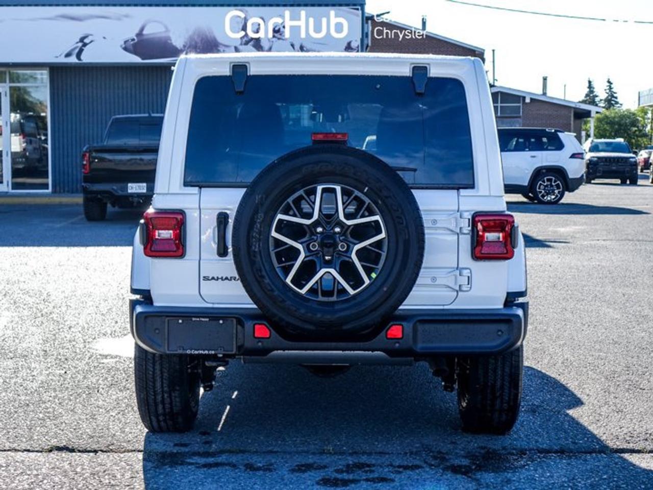 2027 Jeep Wrangler Sahar 2.0L Turbocharged I-4 | Sahara Popular Equipment Group | Sky One-Touch Power Top Photo