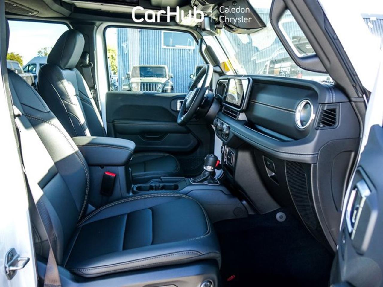 2027 Jeep Wrangler Sahar 2.0L Turbocharged I-4 | Sahara Popular Equipment Group | Sky One-Touch Power Top Photo