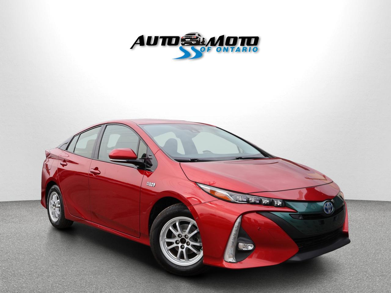 <p>*SAFETY INCLUDED*ACCIDENT FREE*18 SERVICE RECORDS*ONE OWNER<span>*LOW KMS*</span><span> </span><span>Very Nice Clean Toyota Prius Hybrid PLUG-IN Sedan 1.8L 4Cyl with Automatic Transmission. Red on Black Leather Interior. Fully Loaded with: Power Locks, and Power Heated Mirrors, and Power </span><span>Windows</span><span>, AUX, AC</span><span>, Bluetooth, Back Up Camera, Navigation System, Lane Departure Warning, Heated Front Seats, Heated Steering Wheel, Fog Lights, Alloys, Cruise Control, Push to Start, Side Turning Signals, AND ALL THE POWER OPTIONS!! </span></p><p><span>-------------------------------------------------</span><br><span>Financing options are available start from 6.29% with $0 Down payment O.A.C.</span><br><span>-------------------------------------------------</span><br><span>SAFETY CERTIFICATION INCLUDED*** Vehicle comes with: Safety Certification, and Car Fax Report ALL INCLUDED!! At no extra cost to you!! Dont miss this opportunity to own a high-quality, pre-owned vehicle. </span><br><span>-------------------------------------------------</span><br><span>Additionally, our vehicles qualify for up to 4 years of extended warranty. Please speak to your sales representative for more information.</span><br><span>-------------------------------------------------</span><br><span>We are open Monday to Saturday from 10am - 6pm, Sundays Closed.</span><br><span>-------------------------------------------------</span><br><span>We also welcome trade-ins, with on-site buyers available to estimate your vehicle on the same day.</span><br><span>-------------------------------------------------</span><br><span>Visit us at 3219 Harvester Road, Burlington, L7N 3N8 or call us at Nine O Five-281-2255 for more information.</span><br><span>------------------------------------------------</span><br><span>Check our inventory at www automotoinc ca</span></p>