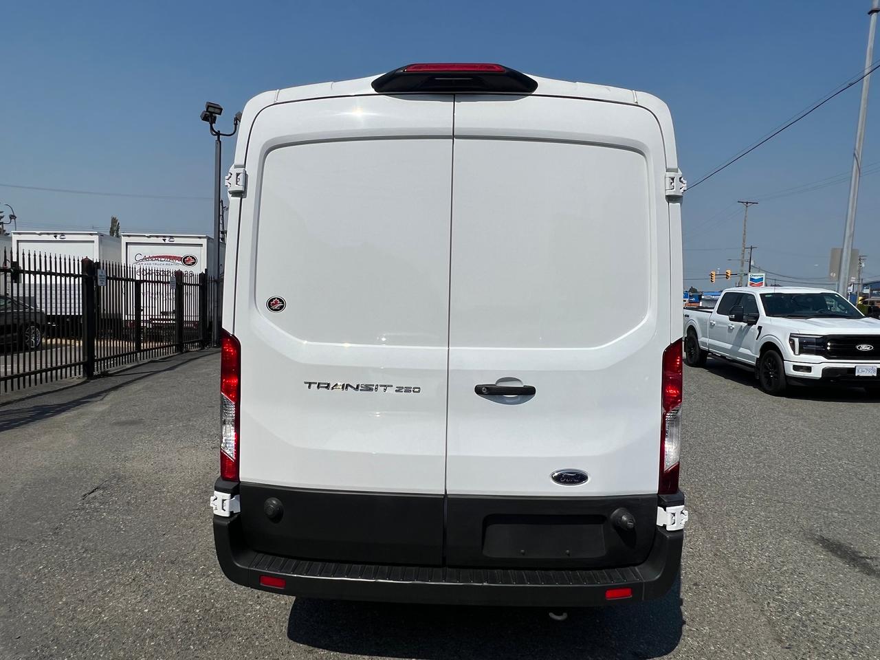 2024 Ford Transit Cargo Van T-250 148" Med Rf 9070 GVWR RWD Photo