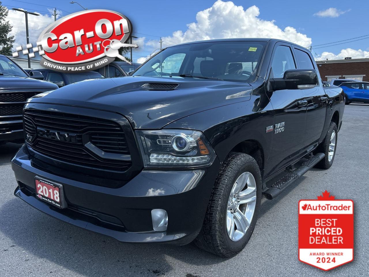 SPORT 4X4 CREW CAB W/ 5.7L HEMI V8!!  Leather, Android Auto/ Apple CarPlay, remote start, 20-innch alloys, 5-foot 7-inch bed w/ spray-in bedliner, tow package, running boards, air conditioning, keyless entry, power locks, power windows, power mirrors, automatic headlights, garage door opener, Bluetooth and more!!This vehicle just landed and is awaiting a full detail and photo shoot. Contact us and book your viewing today!