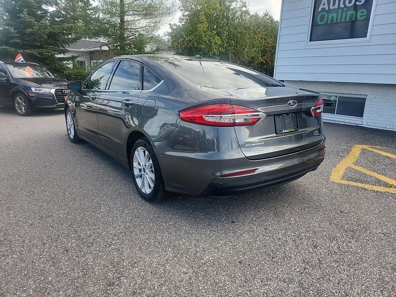 2020 Ford Fusion Energi SEL-Hybrid - drive  assist -heated seats-4 brand new tires -Apple CarPlay-Distance auto start Photo2