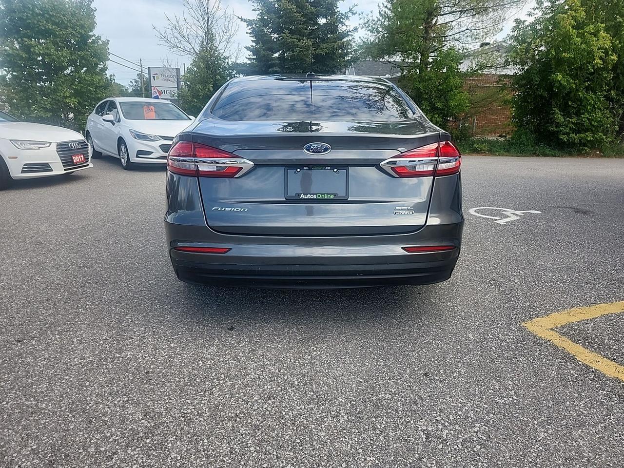 2020 Ford Fusion Energi SEL-Hybrid - drive  assist -heated seats-4 brand new tires -Apple CarPlay-Distance auto start Photo3