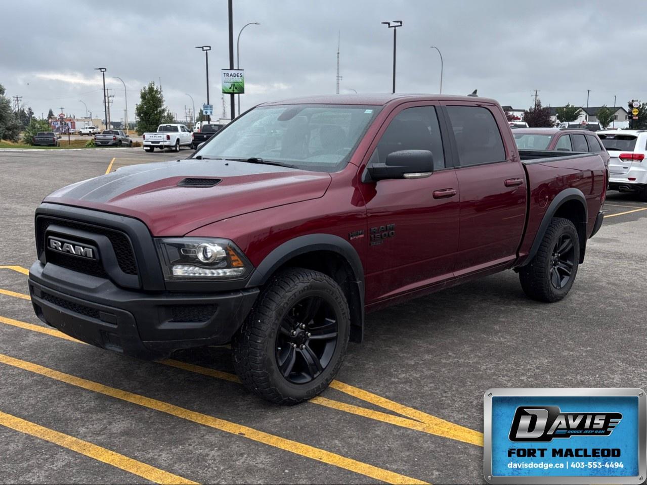 <p>Introducing the bold 2021 Ram 1500 Classic Warlock 4x4 Crew Cab, a stunning red powerhouse designed to tackle Canadian roads with confidence. With its dynamic drivetrain and **4x4** capability, this truck is ready to handle any challenge with ease.</p> <p><strong>Exterior Features:</strong></p> <ul><li>Rugged body type that embodies strength and durability</li><li>Alloy wheels that provide both style and performance</li><li>Heated mirrors to ensure visibility in all weather conditions</li></ul> <p><strong>Interior Features:</strong></p> <ul><li>Spacious cabin with air conditioning for year-round comfort</li><li>Convenient keyless entry and power windows for ease of access</li><li>Cruise control for relaxed and stress-free driving on long stretches</li></ul> <p><strong>Technology & Safety Features:</strong></p> <ul><li>Advanced backup camera to enhance parking precision</li><li>Bluetooth connection integrated for seamless communication and entertainment</li><li>Parking sensors to aid in safe maneuvering</li><li>Brake assist technology for additional safety on the go</li></ul> <p>Perfect for adventurers, families, or professionals in need of a reliable, rugged vehicle, this Ram 1500 Classic is essential for those who crave power and functionality. Interested in experiencing the might of the Warlock? Contact Davis Dodge Fort Macleod today for a test drive and more details!</p>
